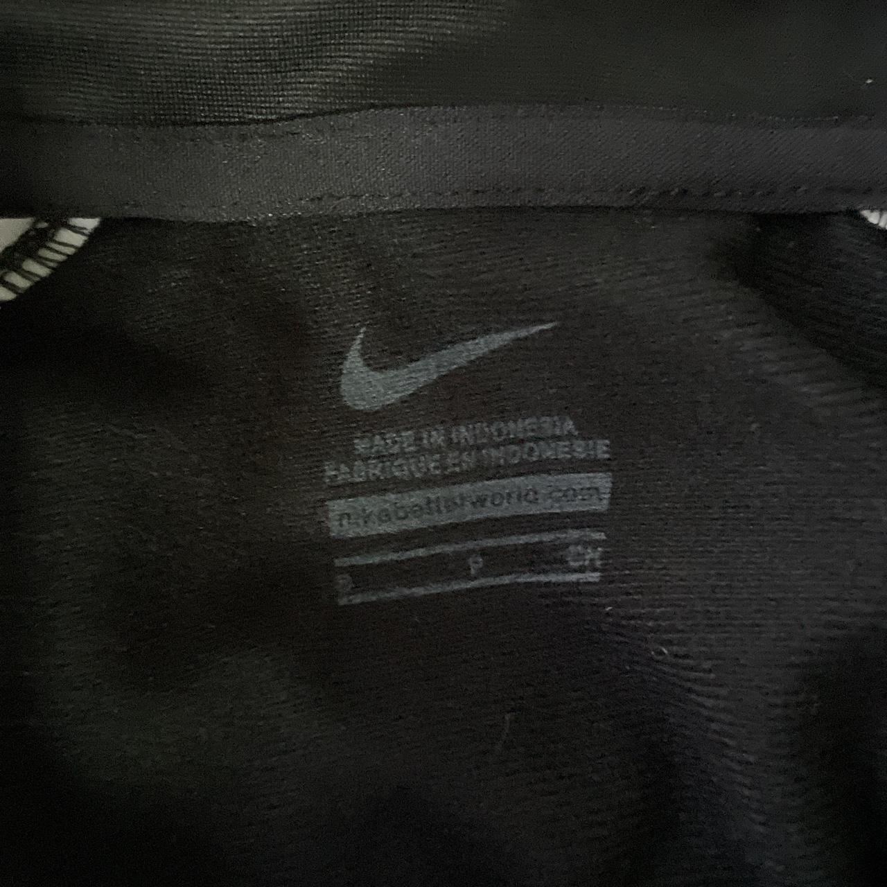 Black Nike zip up tracksuit training top. Size men’s... Depop