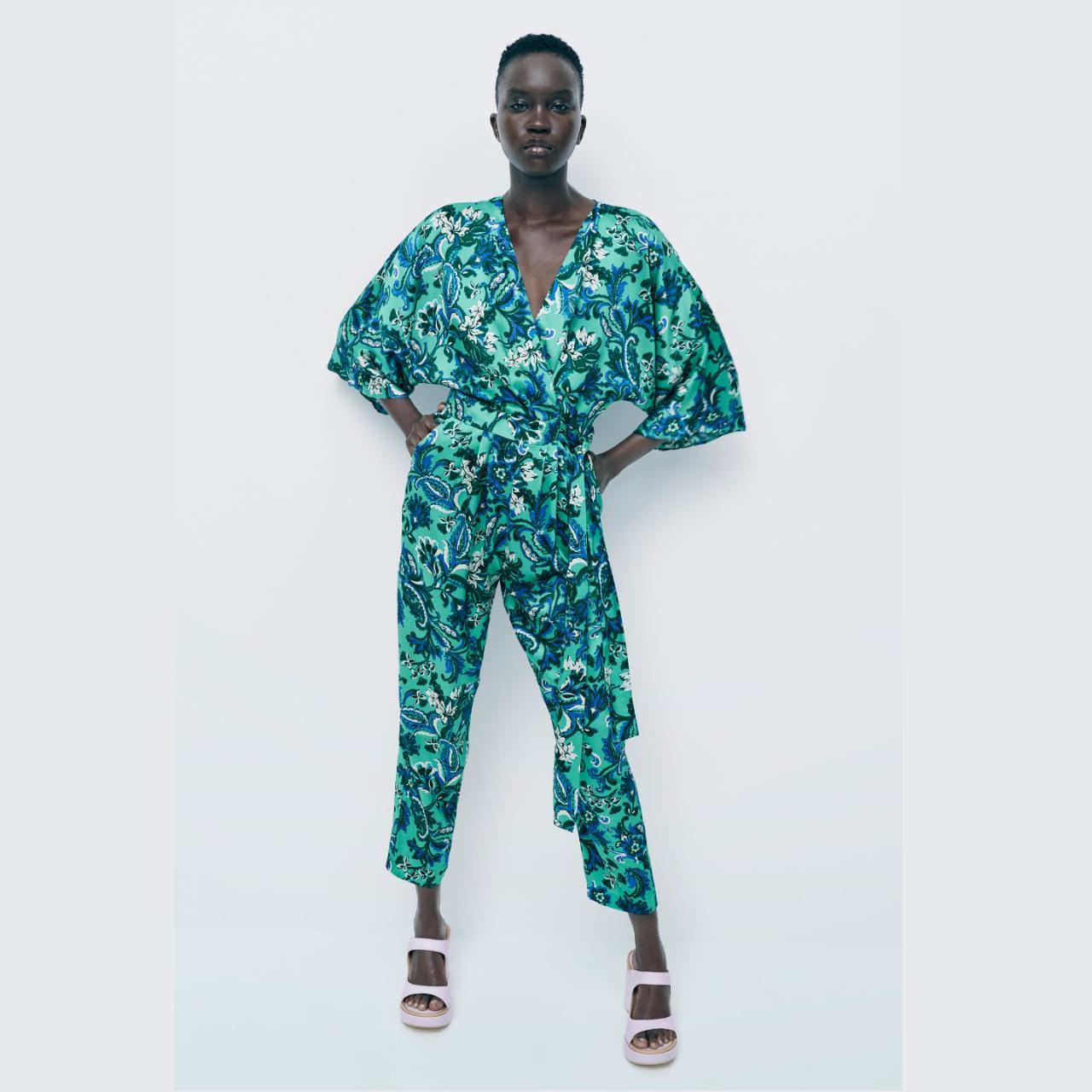 Long Vneck jumpsuit with full cut belowtheelbow... Depop