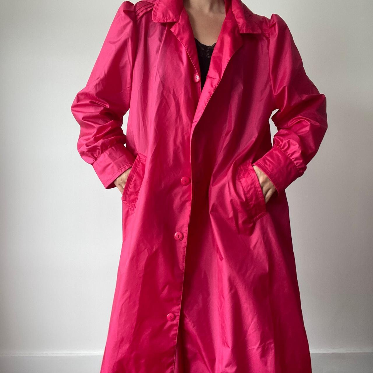 Vintage 1980s magenta raincoat by Totes with the...