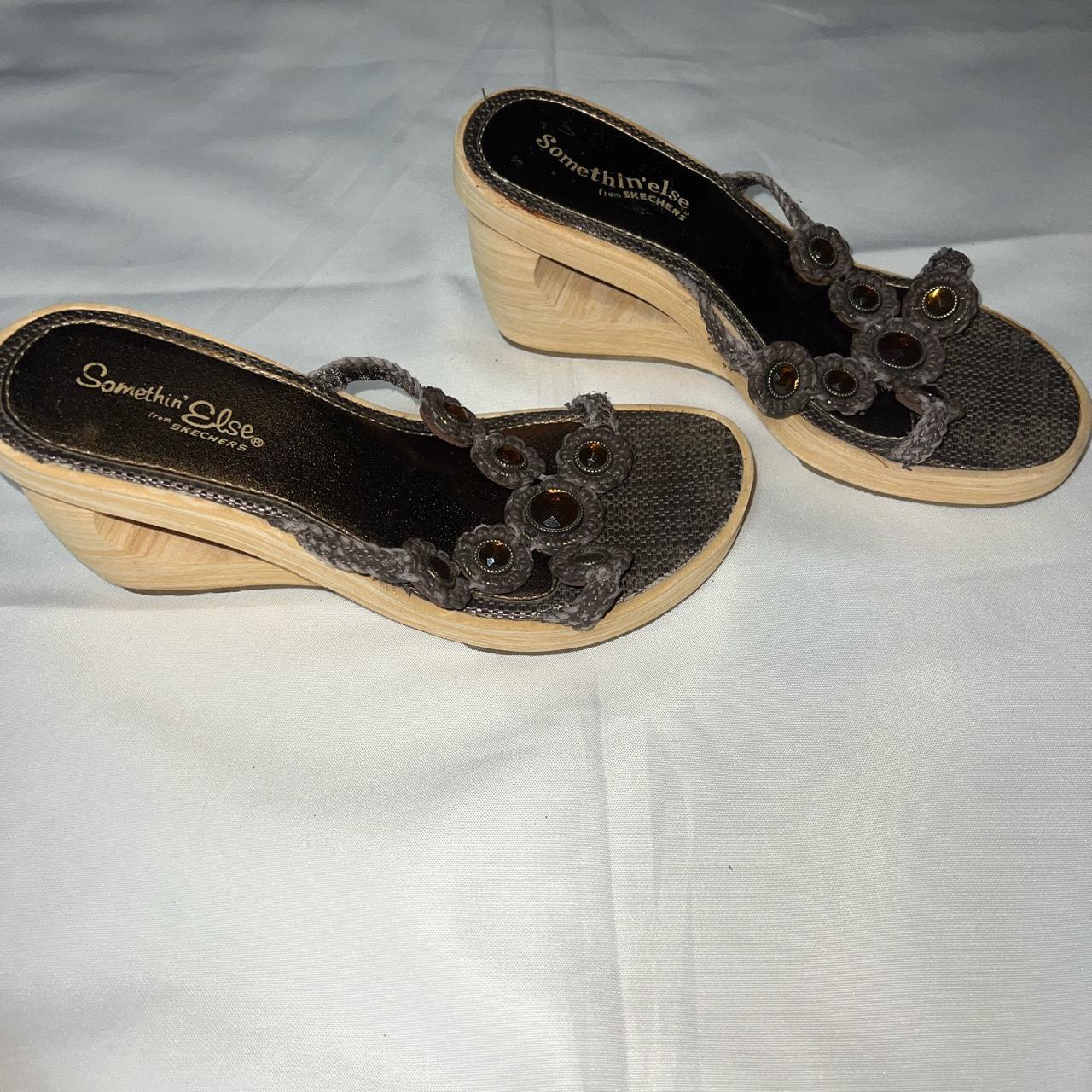 Sketchers on sale black wedges