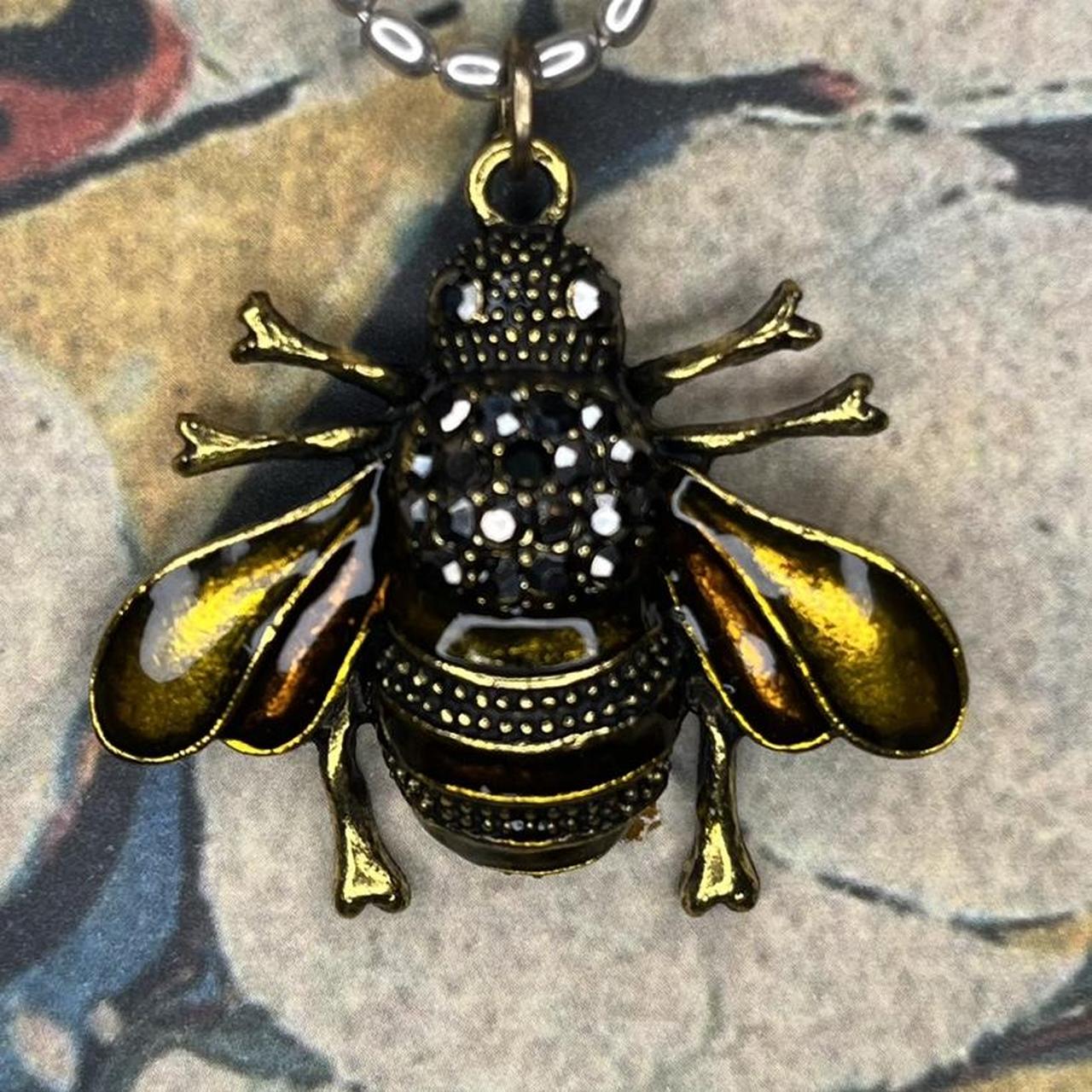0.09 CT. T.W. Diamond Bumblebee Pendant in 10K Gold | Peoples Jewellers