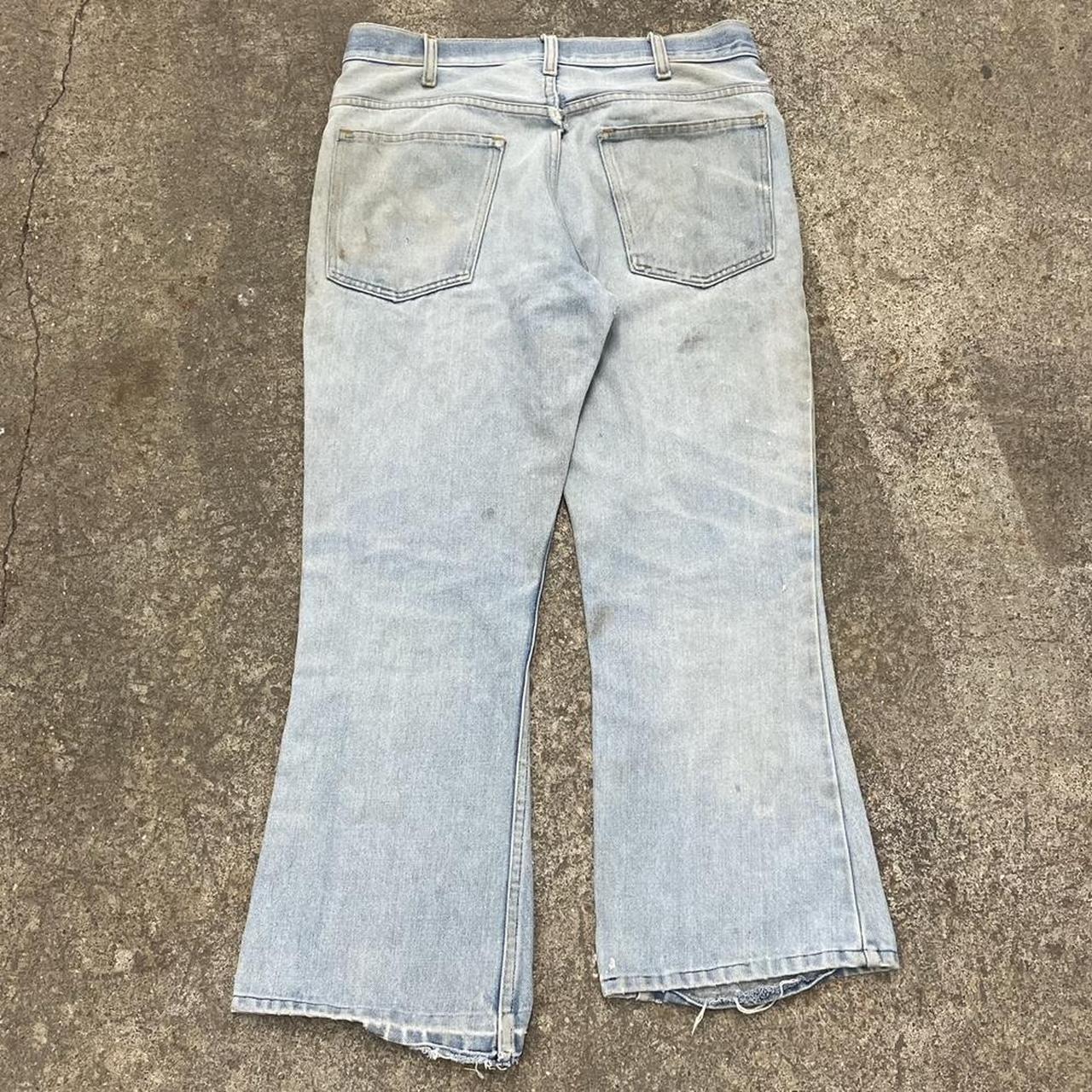 Vintage faded and holey plain pocket bootcut... - Depop