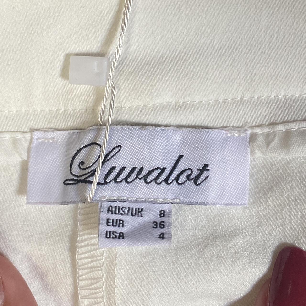 Mini white skirt / skort Never been worn still has... - Depop