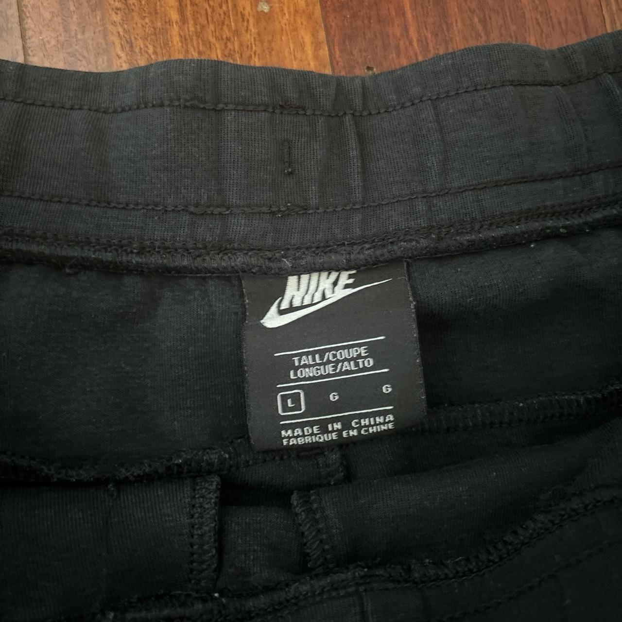Nike tech fleece pants size Large and tall damage to... - Depop