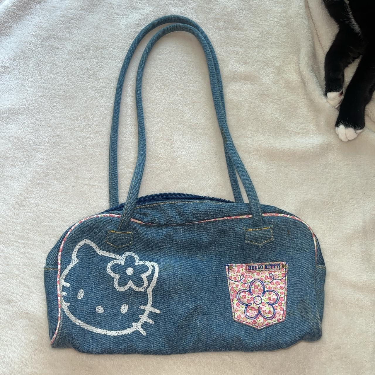 black hello kitty purse it is peeled up a bit in - Depop