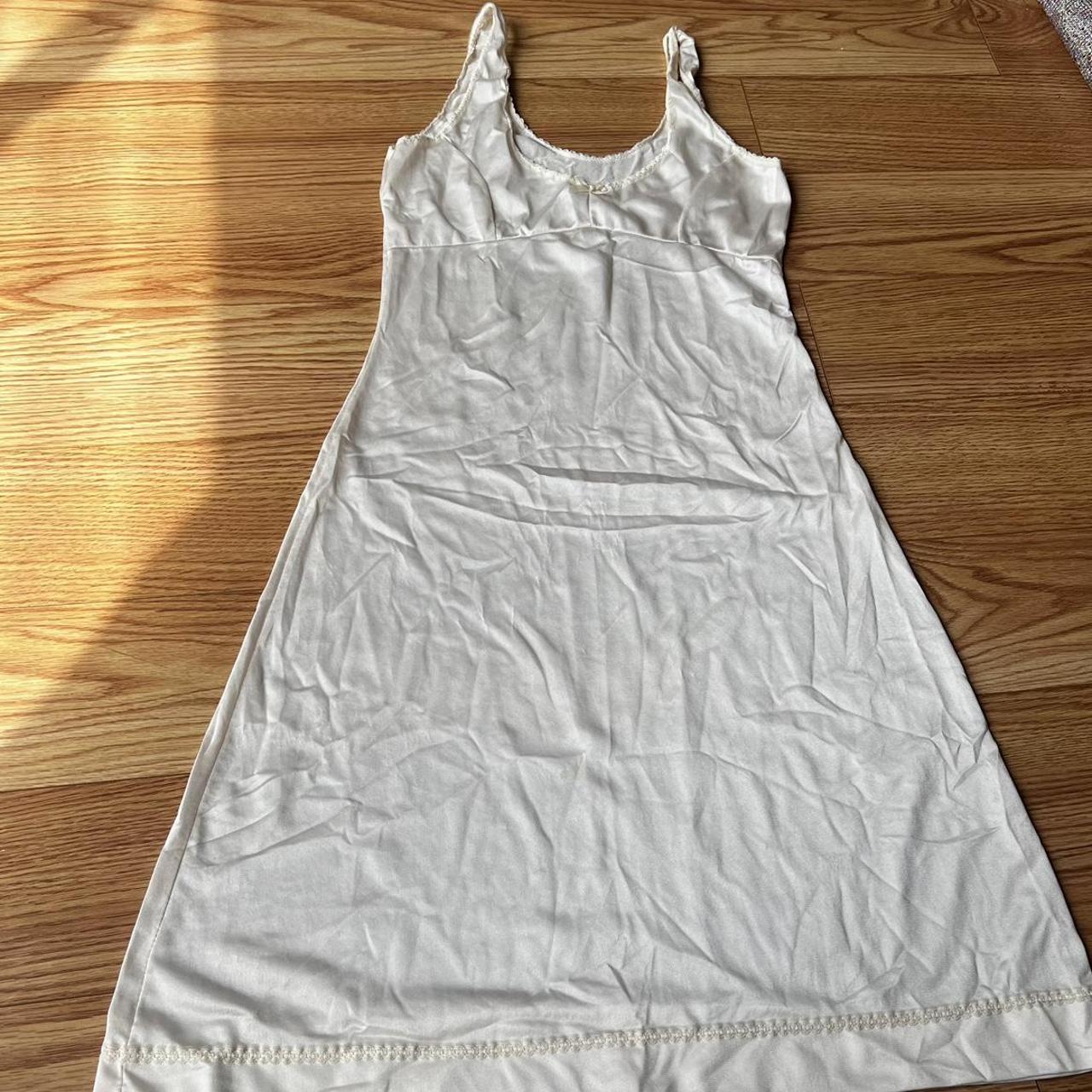 adorable cream baby doll slip has a couple of marks - Depop