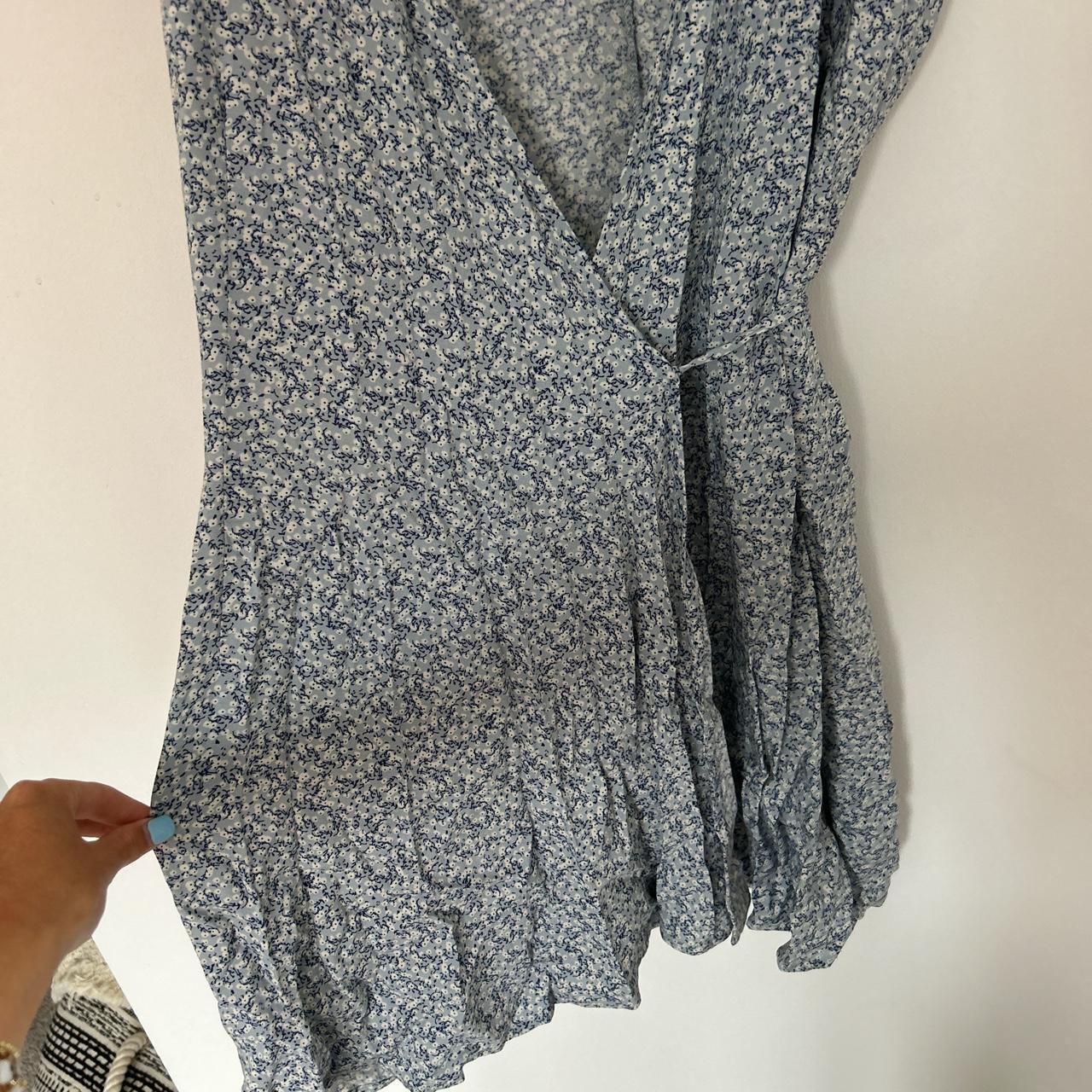 Brandy Melville blue and white flower wrap dress.... - Depop