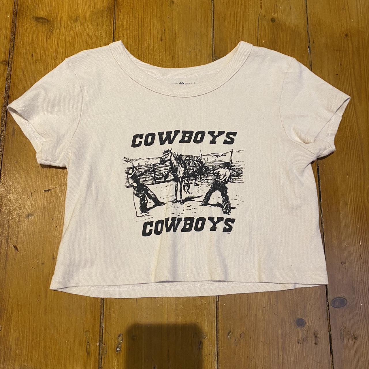 cream brandy melville ‘cowboys’ tshirt fits like a... Depop