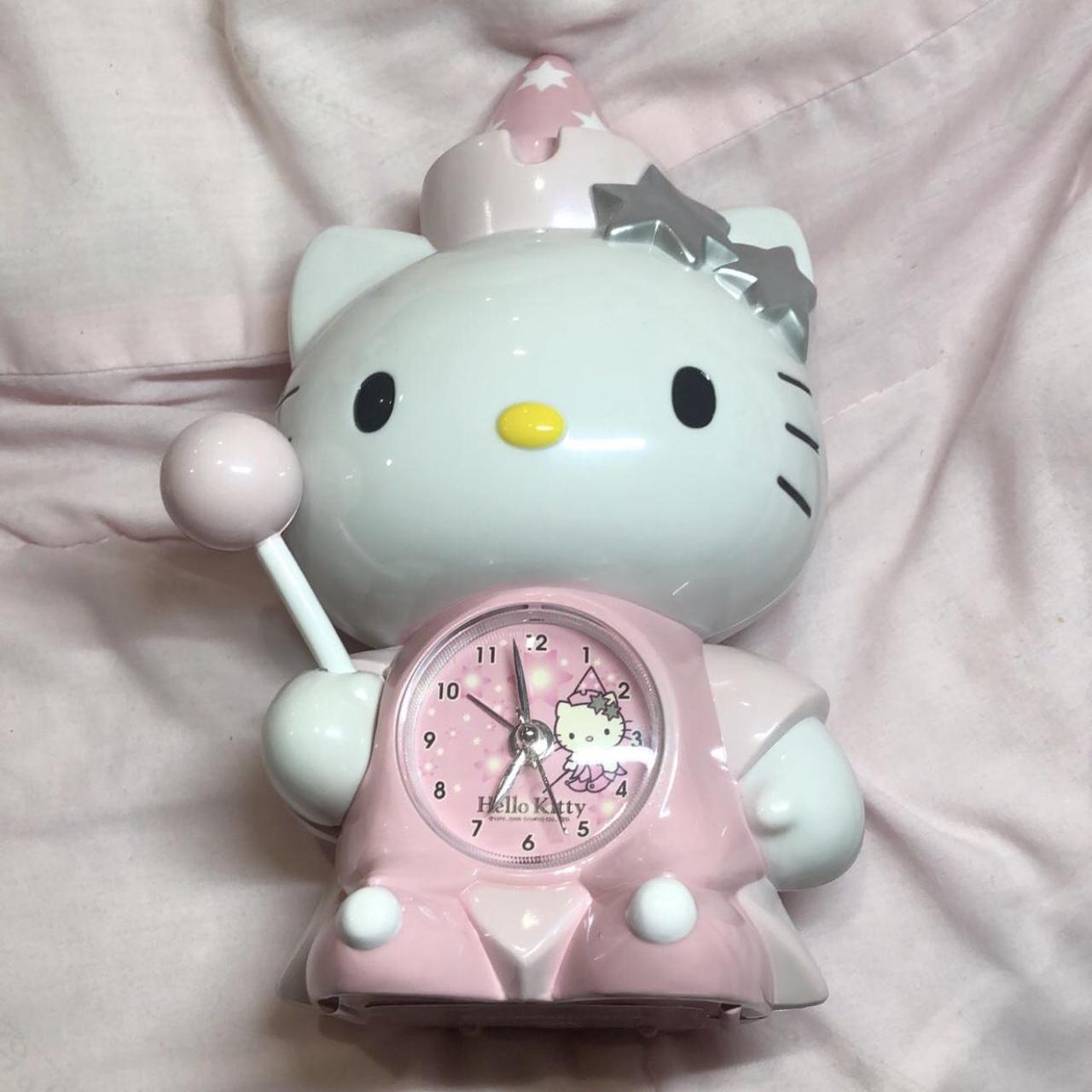 SOLD - Hello Kitty Tea Cup Alarm Clock Radio and Night Light 