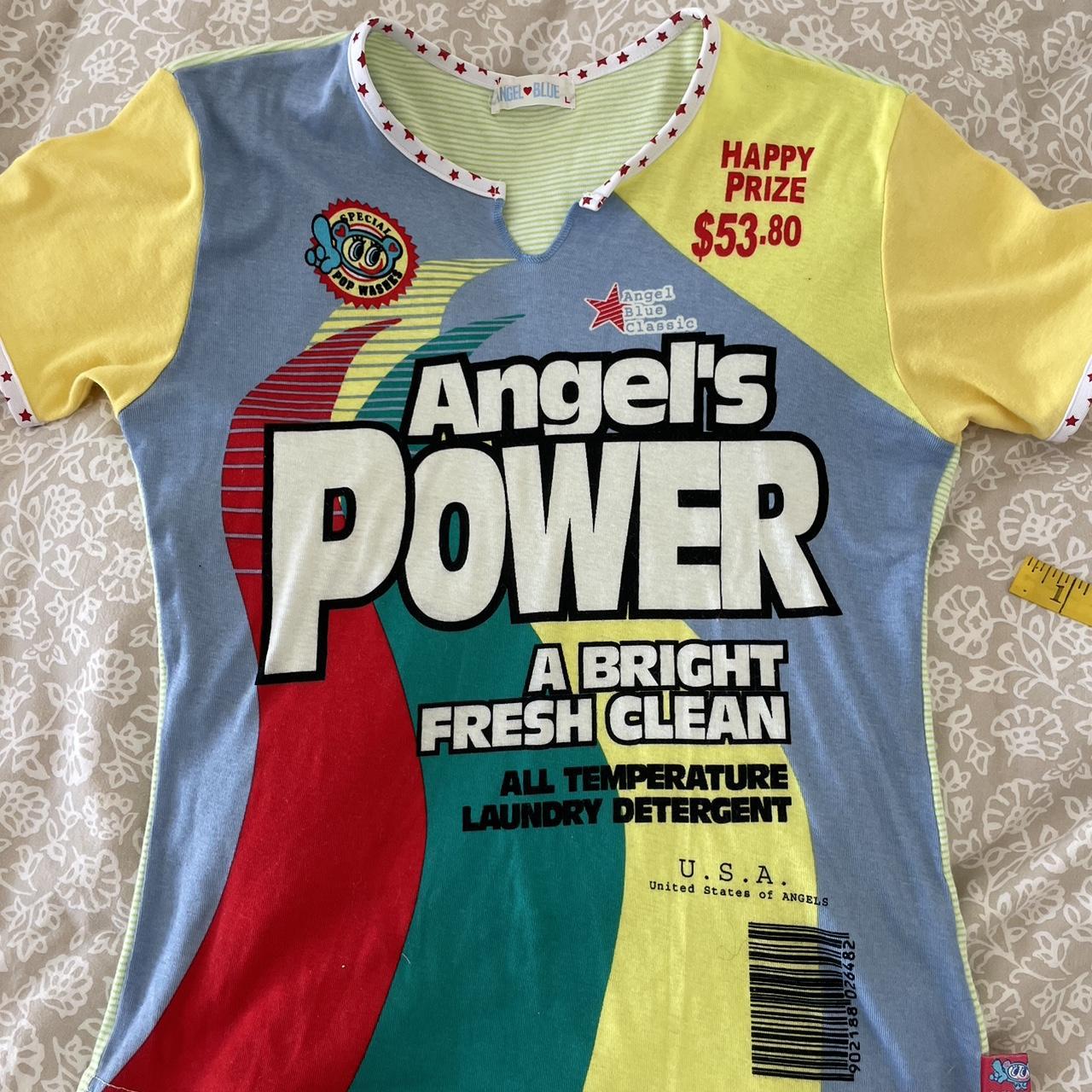 Angel blue top labeled size L fits more like a... Depop