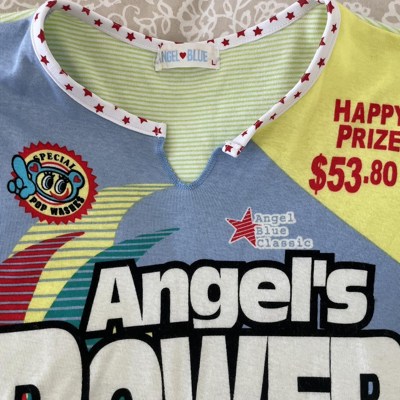 Angel blue top labeled size L fits more like a... Depop