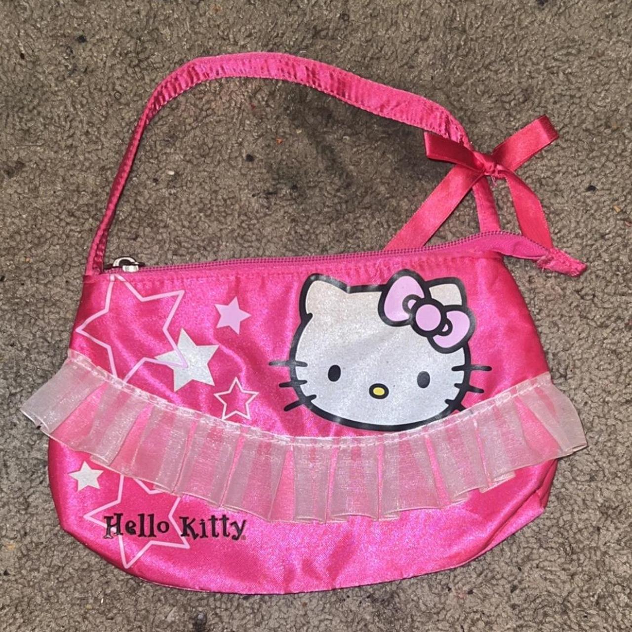 A hello kitty small purse #pink #hellokitty... - Depop