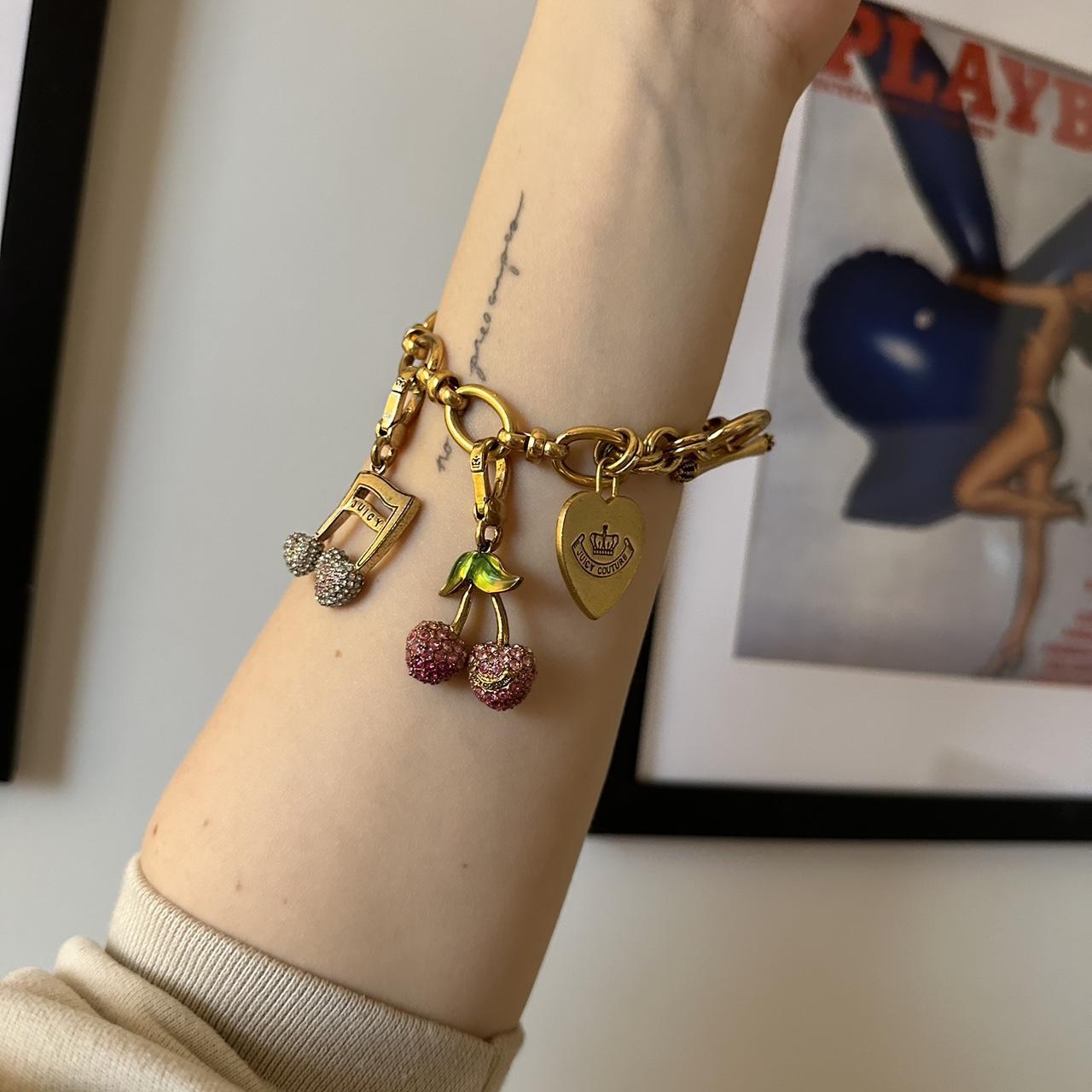 Juicy Couture Jewelry Gold charm bracelet with - Depop