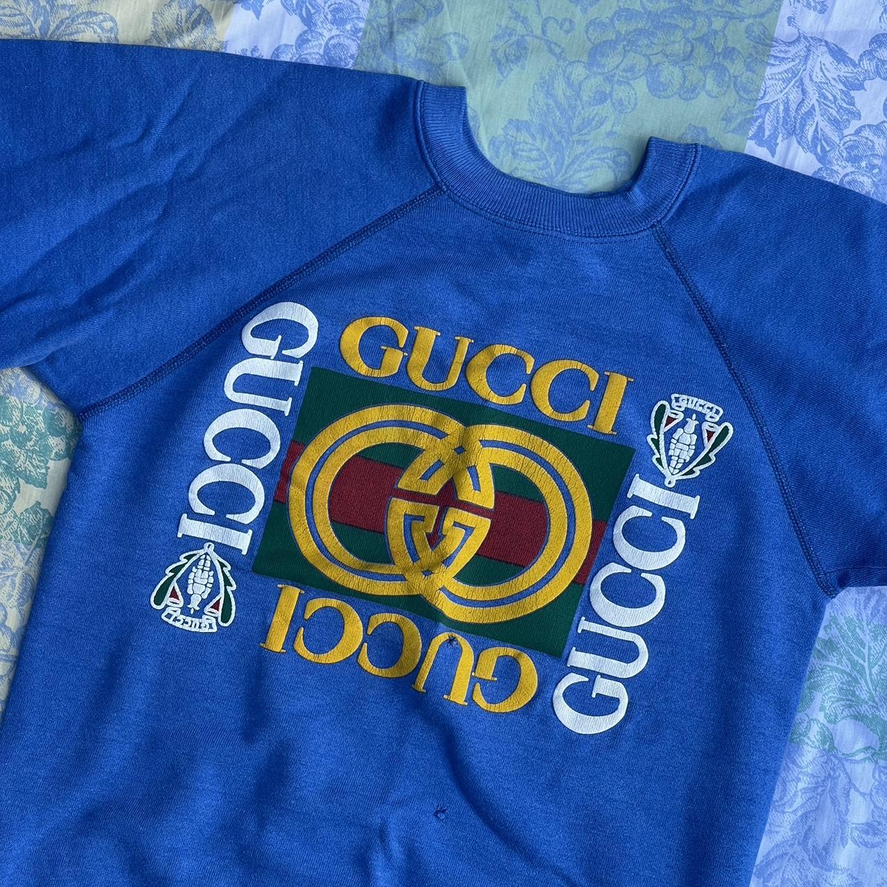 Authentic Vintage Gucci Blue Crewneck Has a few. Depop