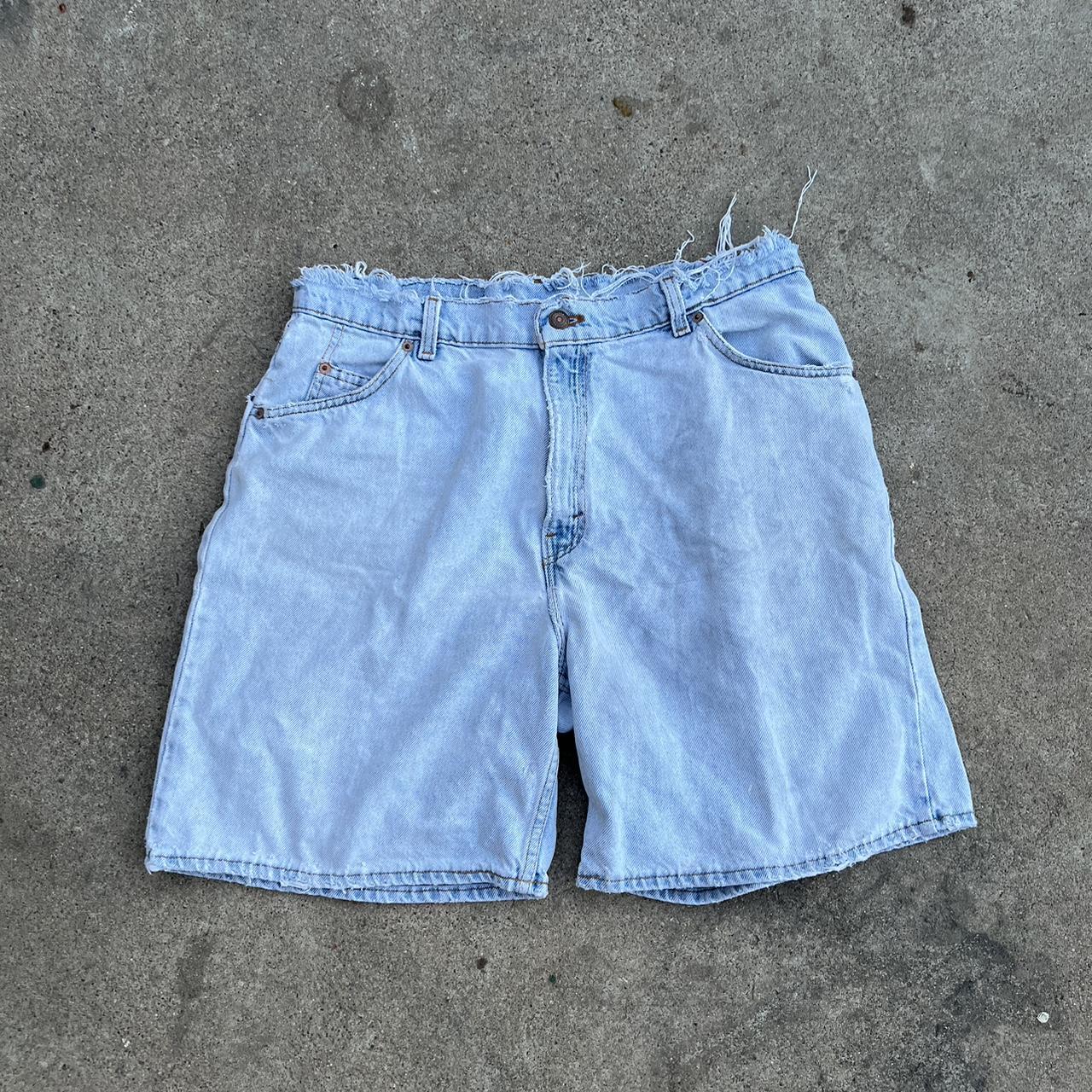 Distressed orange tab Levi’s Jean shorts Size 34 - Depop