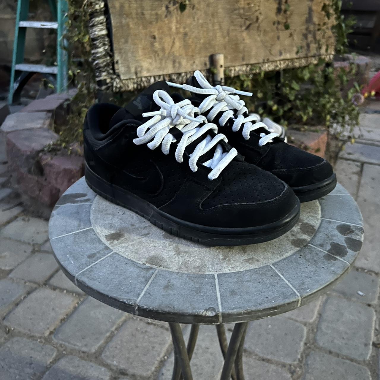 undefeated all black dunks
