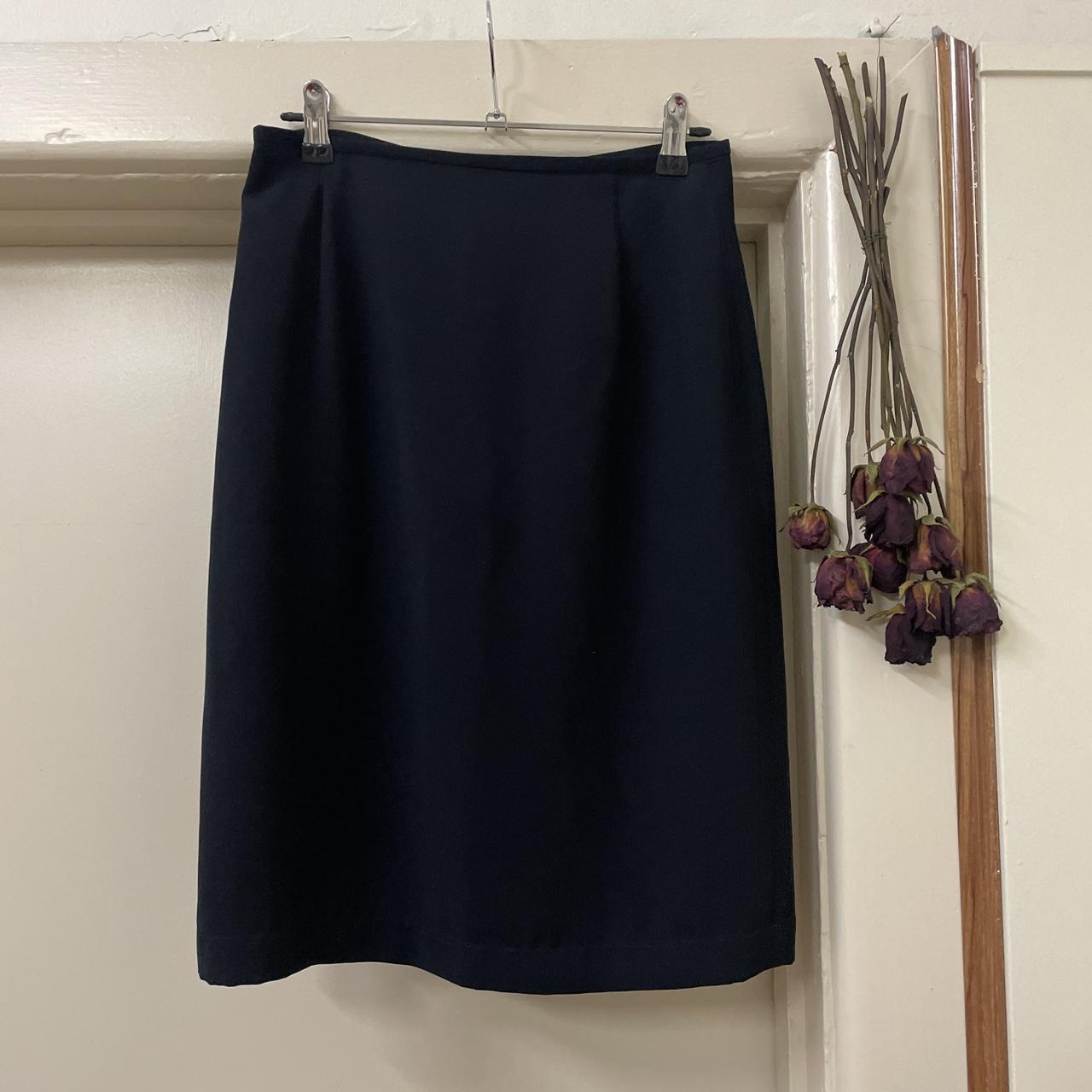 Cute knee length navy skirt. No tags. Size 8/10 - Depop