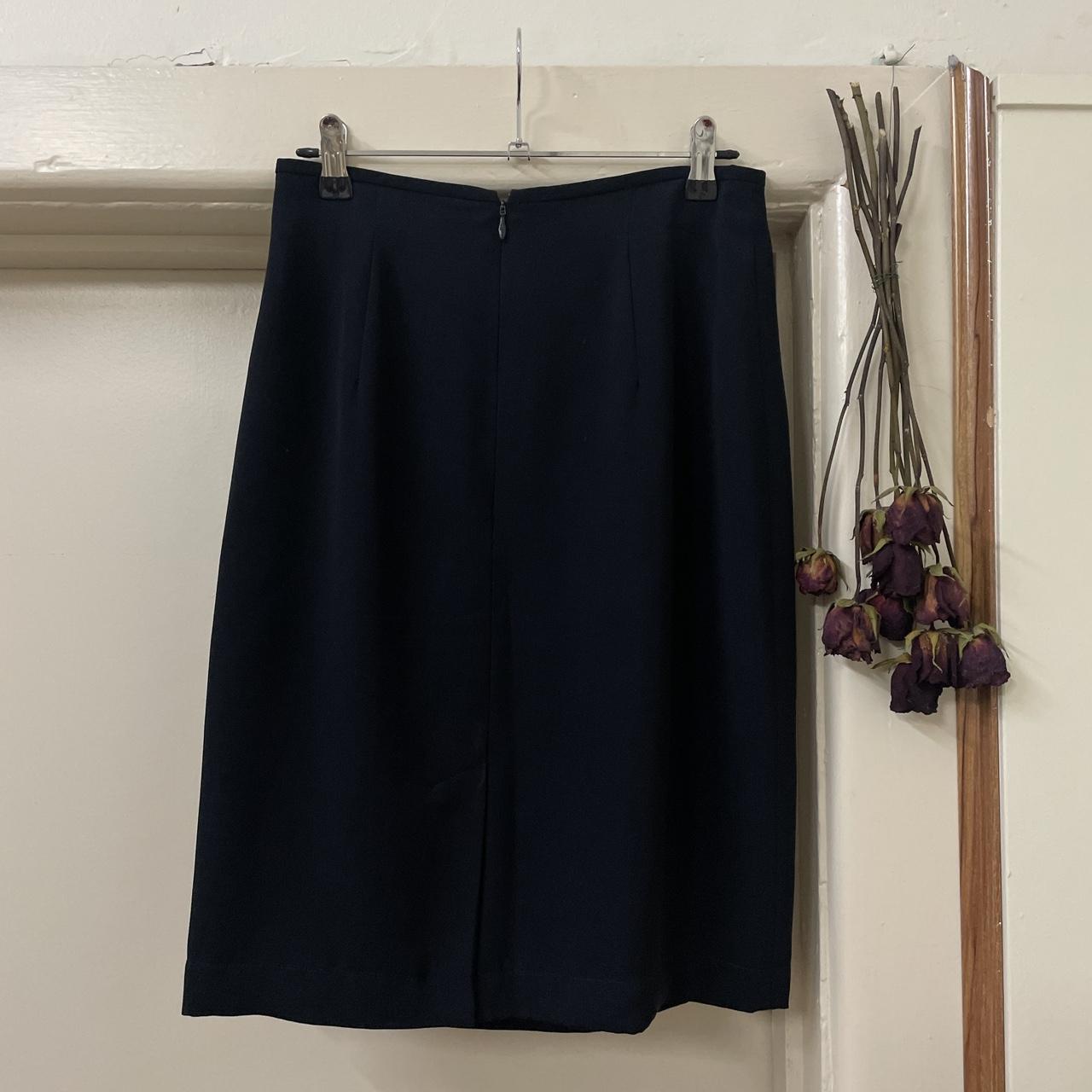 Cute knee length navy skirt. No tags. Size 8/10 - Depop