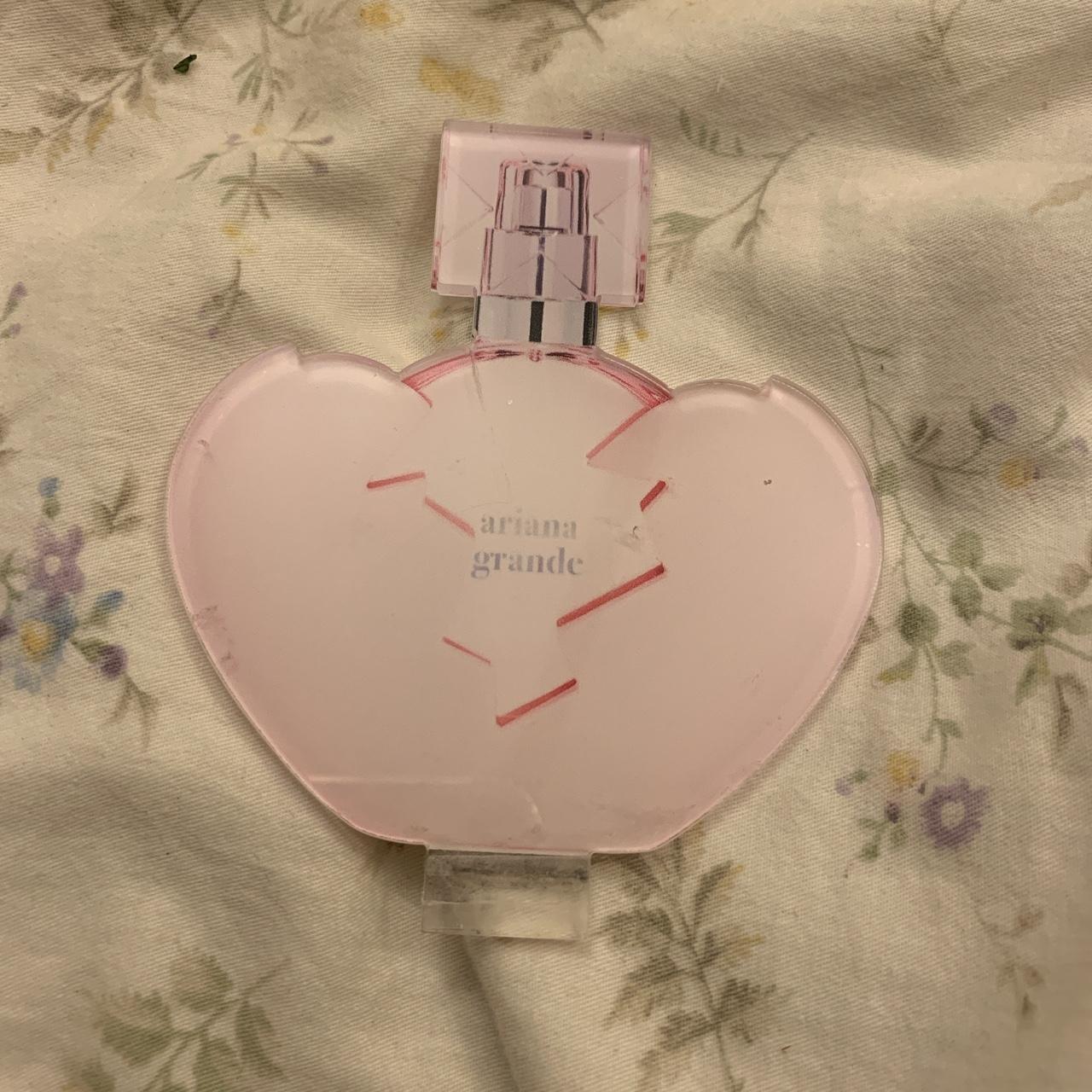 Ariana grande pink perfume display from Superdrug... Depop