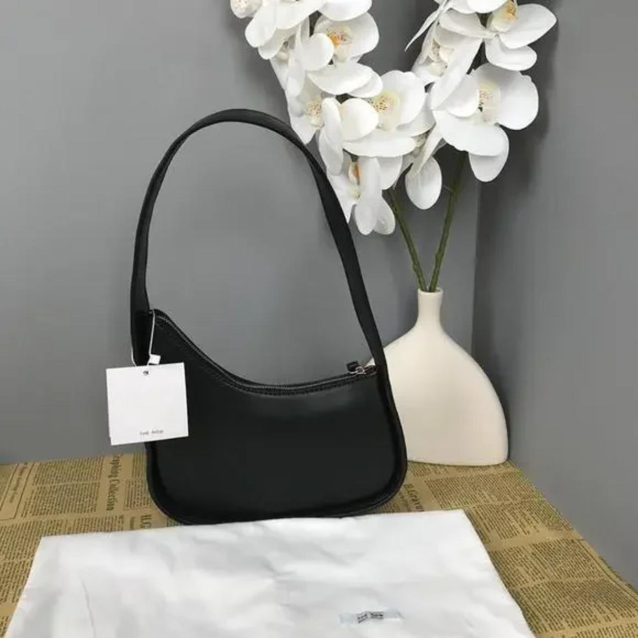 Gently Used Leather Half Moon Bag The Row This sleek