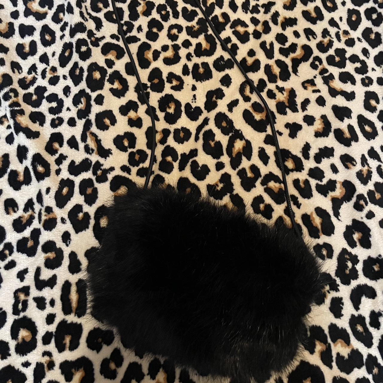 Thrifted black furry purse. These remind me of the... Depop