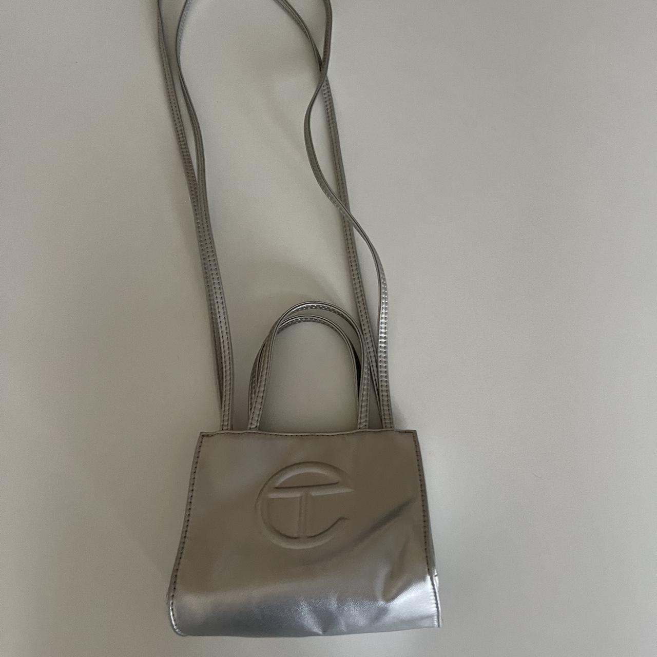 Silver telfar bag, used, few stains inside Depop