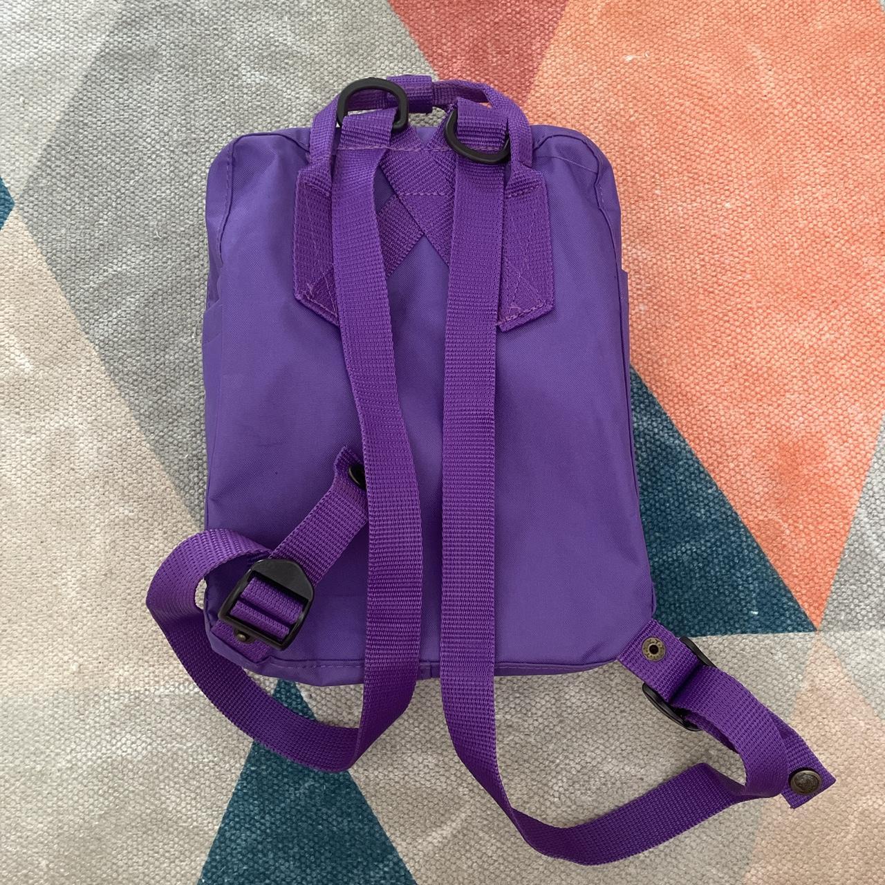 purple kanken mini! can easily fit an ipad and case... Depop