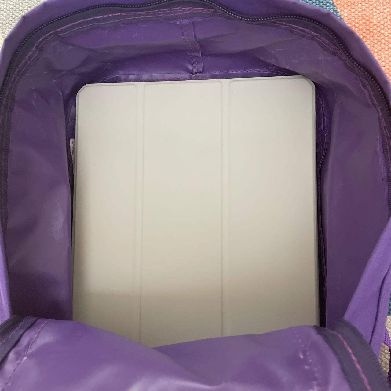 purple kanken mini! can easily fit an ipad and case... Depop