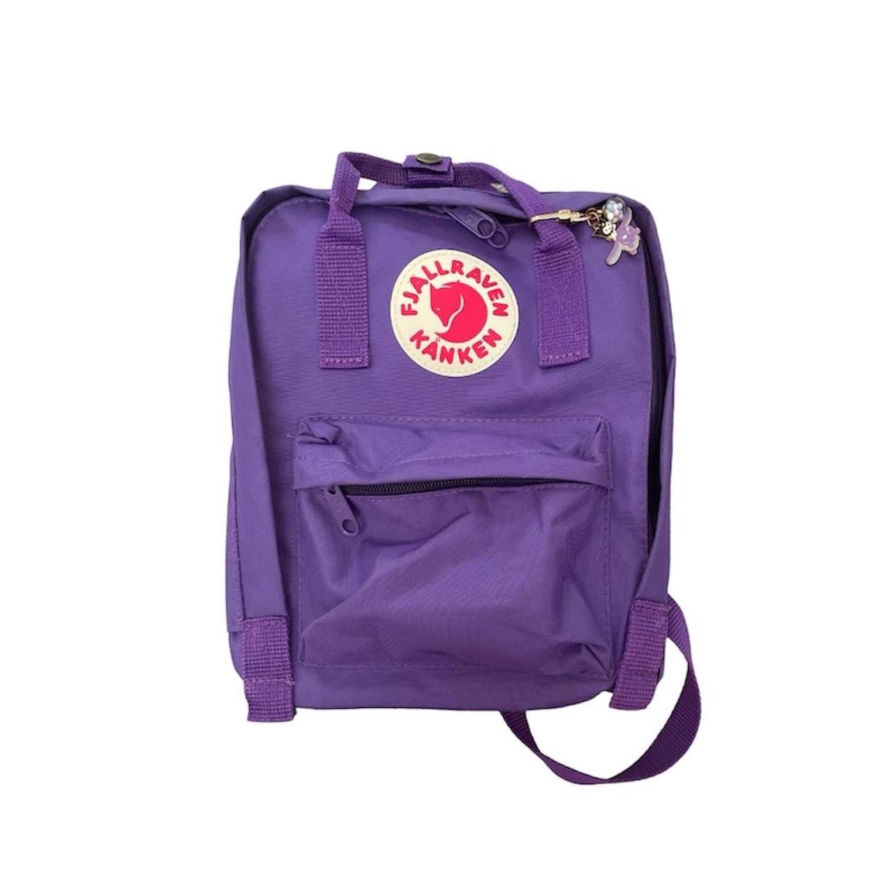purple kanken mini! can easily fit an ipad and case... Depop