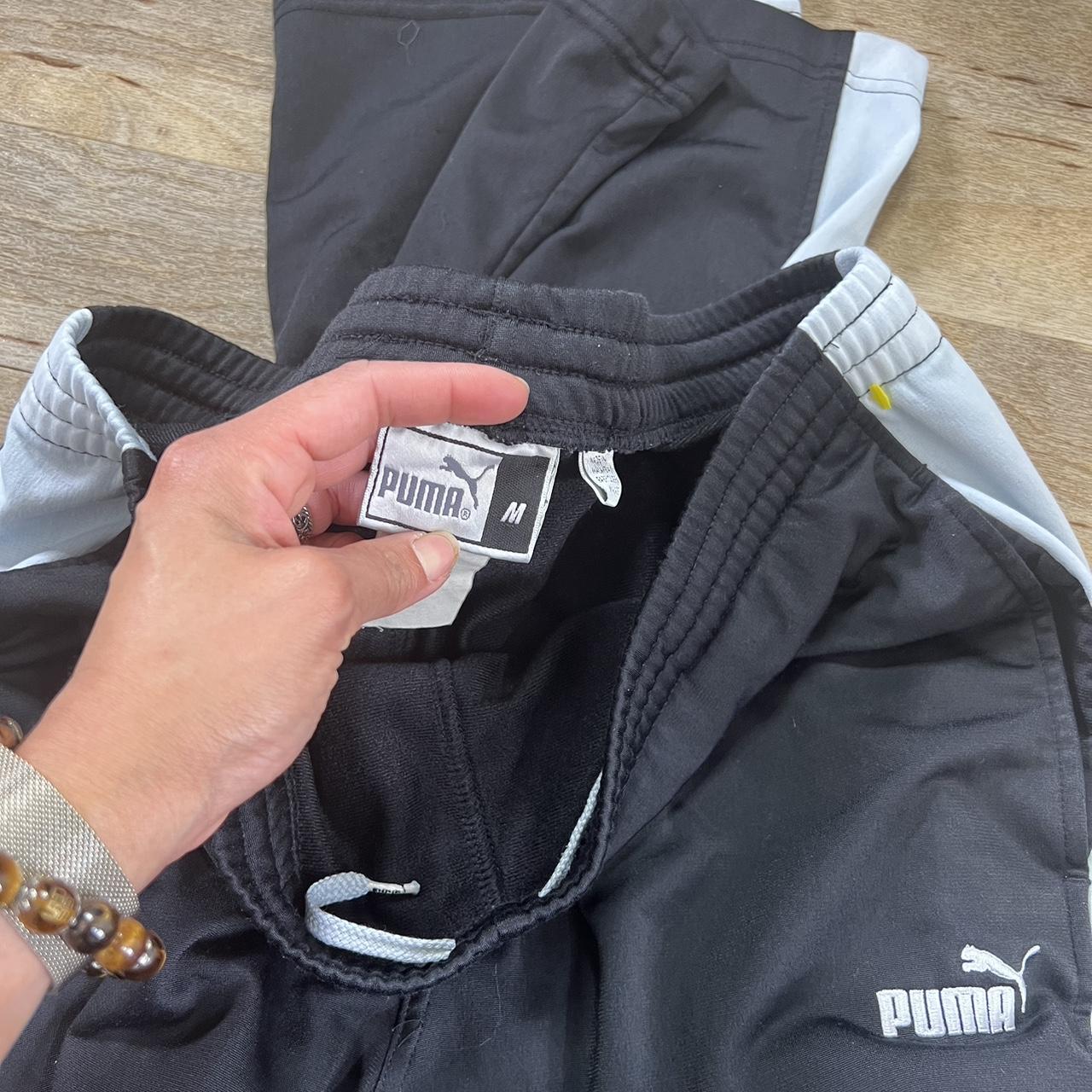 Puma track pants with best sale zipper pockets