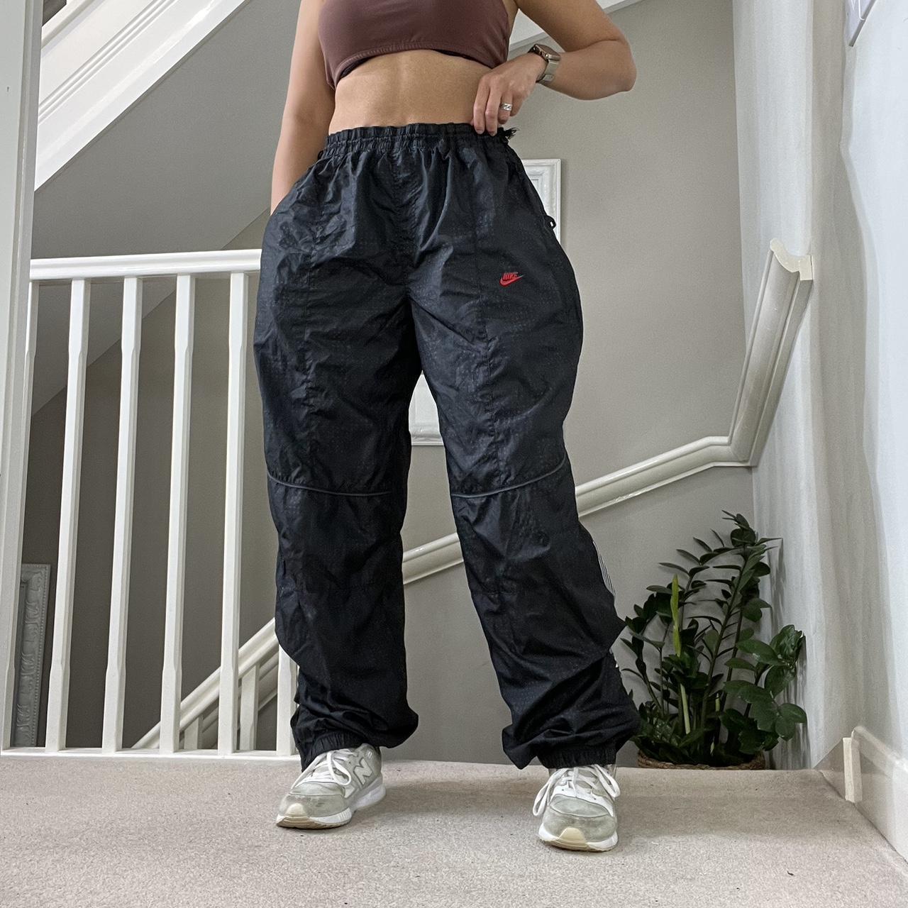 Nike air windbreaker online pants