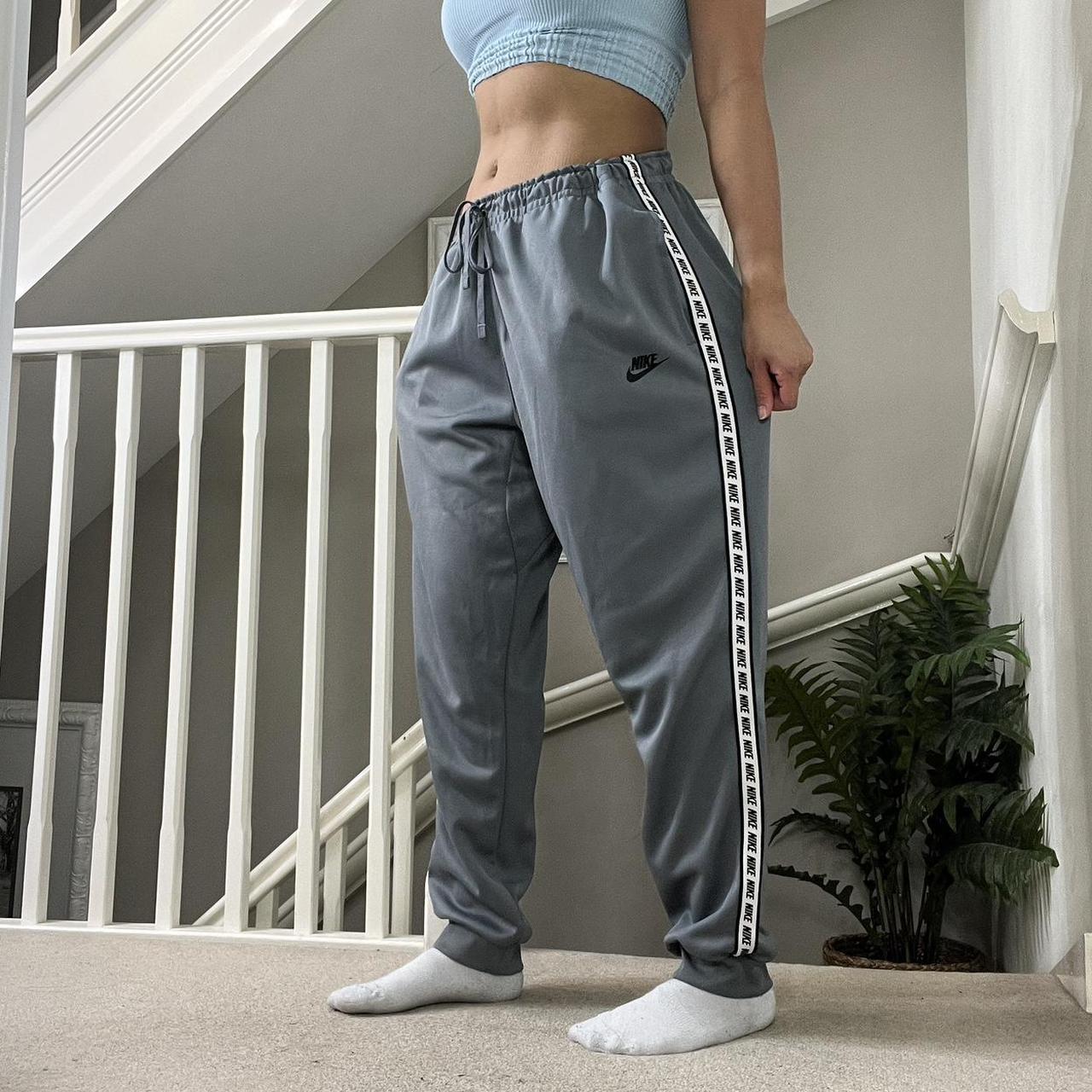 Nike repeat tape track pants sale