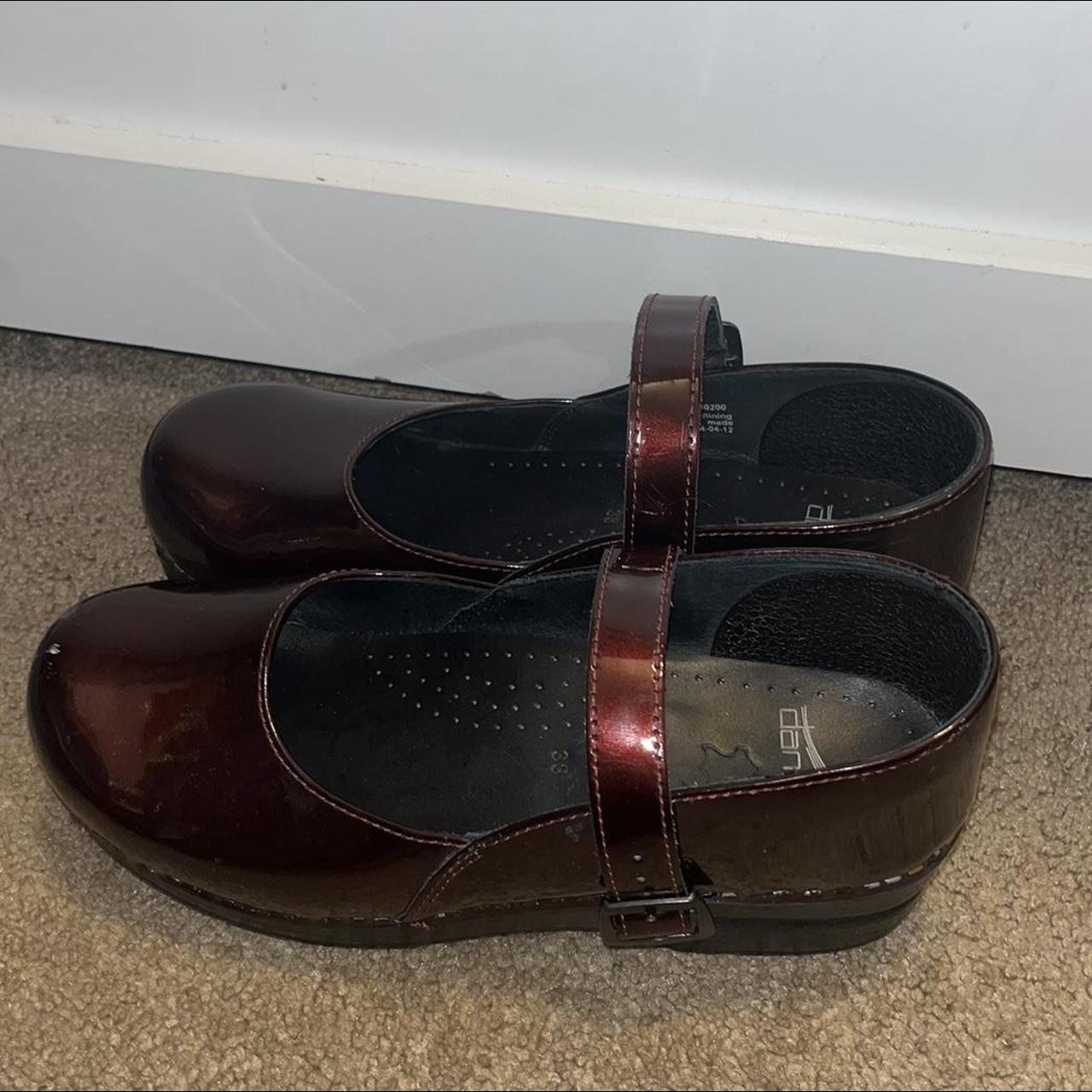 Dansko Women's Burgundy and Black Clogs | Depop