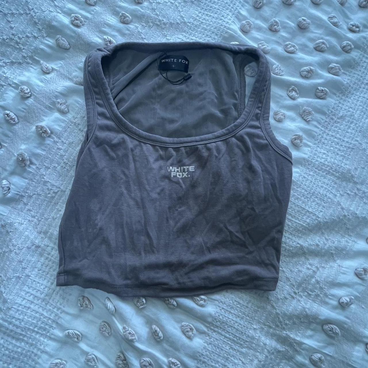 Brown white fox tank Size small, second photo is... - Depop