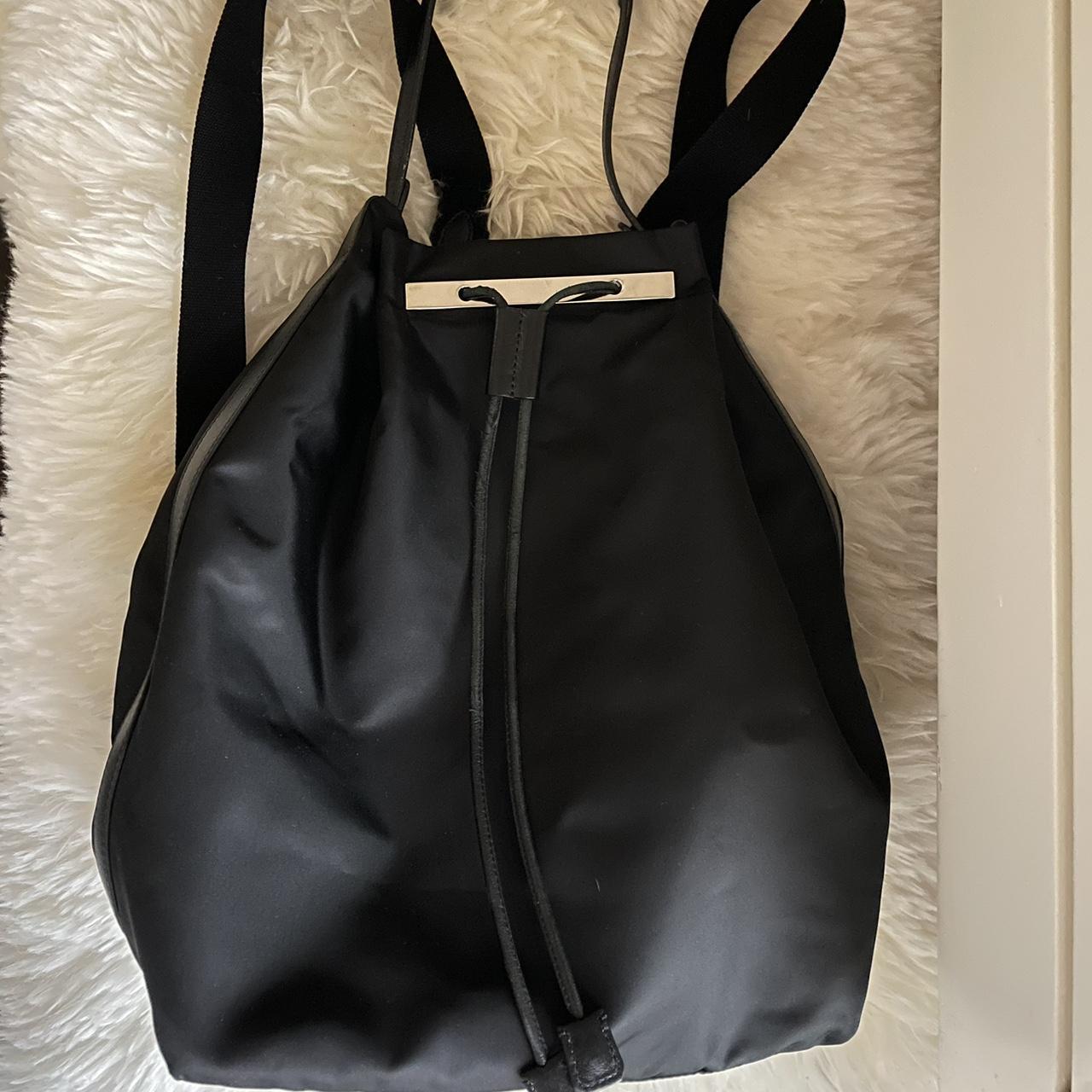 DISCONTINUED the row 11 black nylon backpack Depop