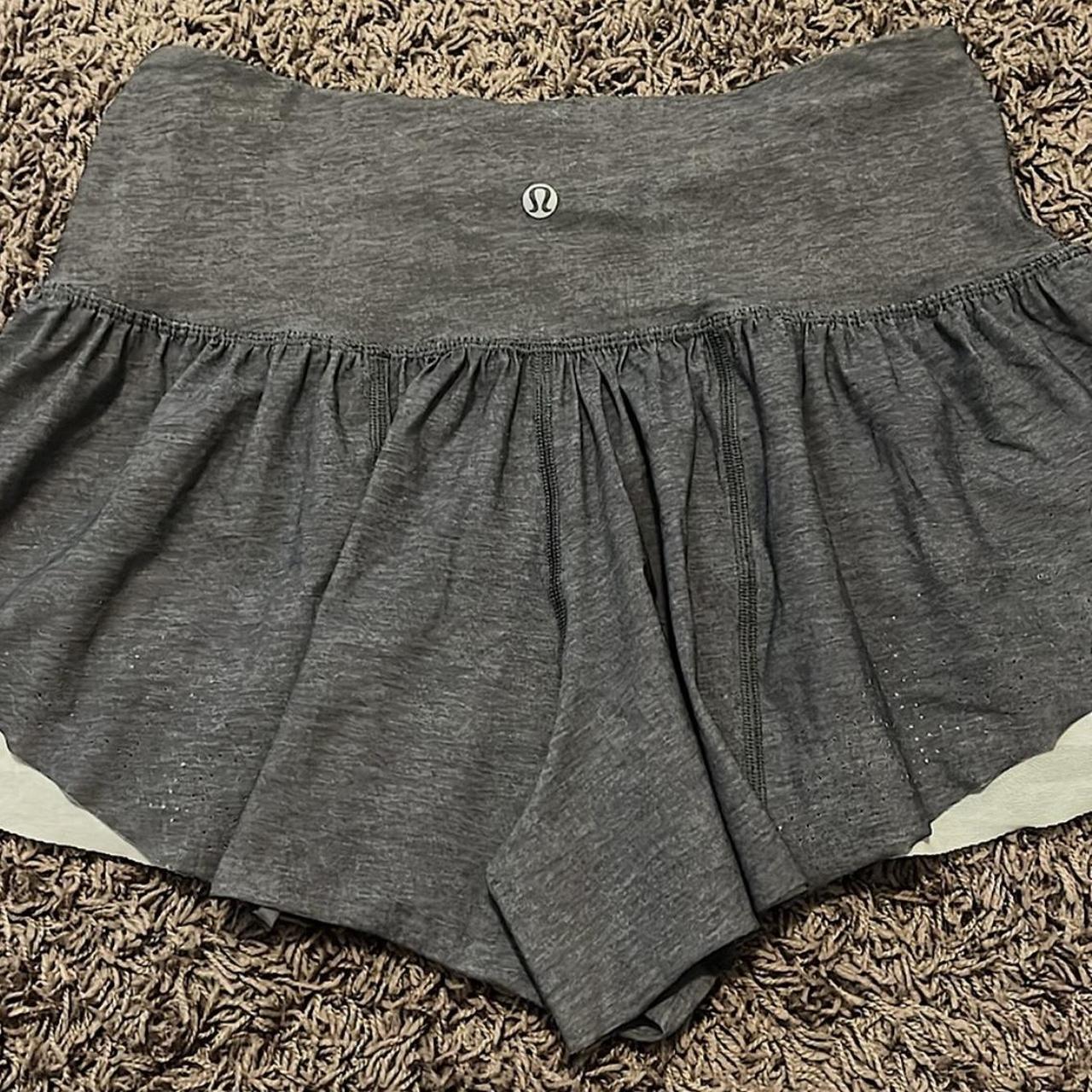 Lululemon grey and white flowy shorts good used... - Depop