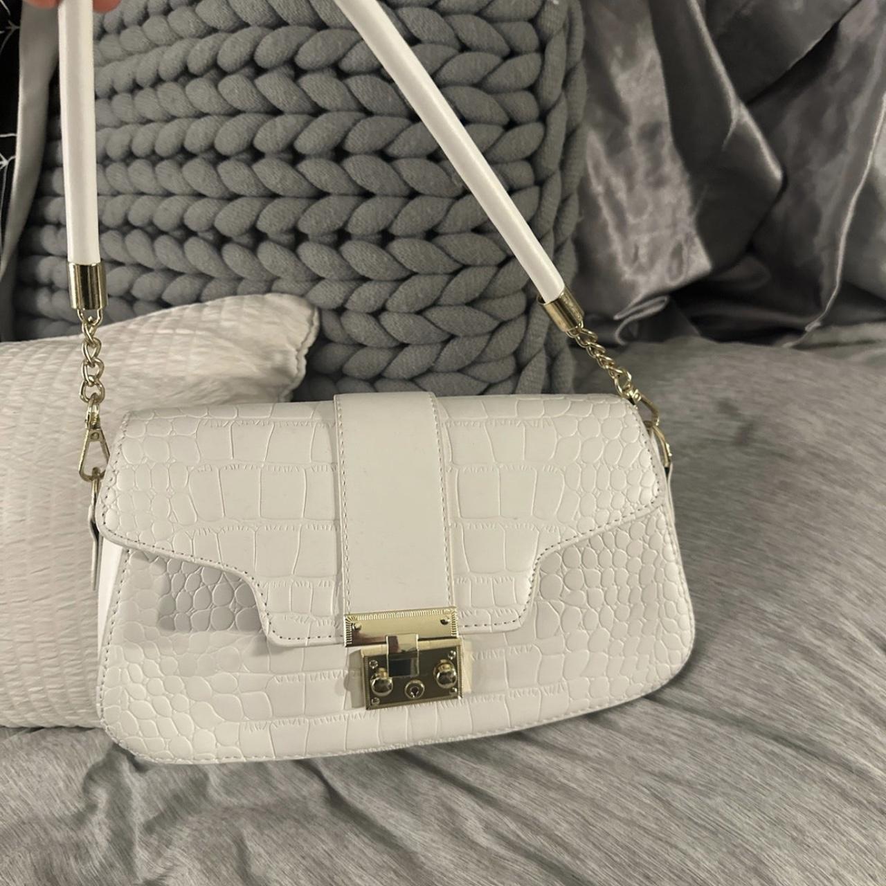 white purse clasp is hard to close unless purse is... - Depop