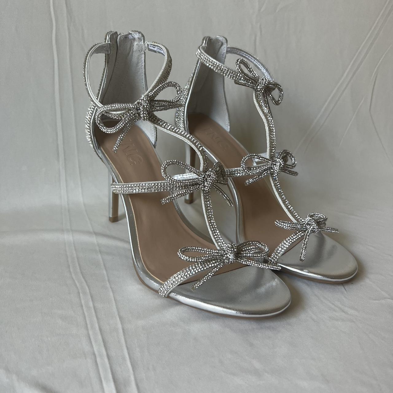 rhinestone/silver bow heels from Macy's Depop