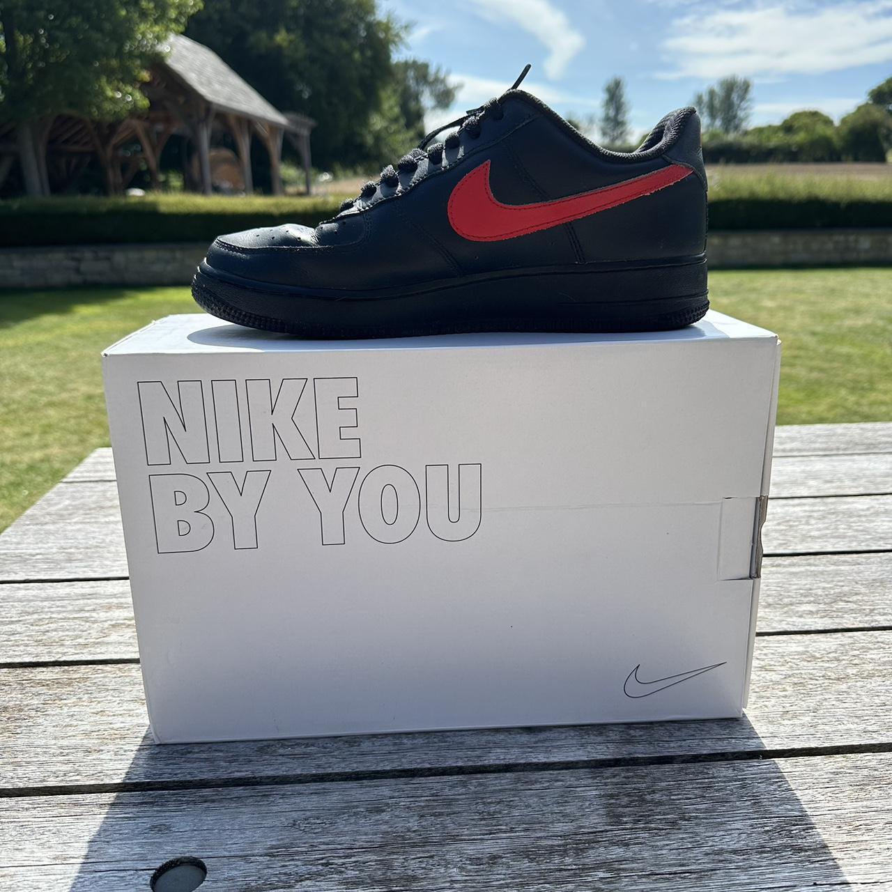 Black and red Nike Air Force 1 size 9.5 UK . Depop