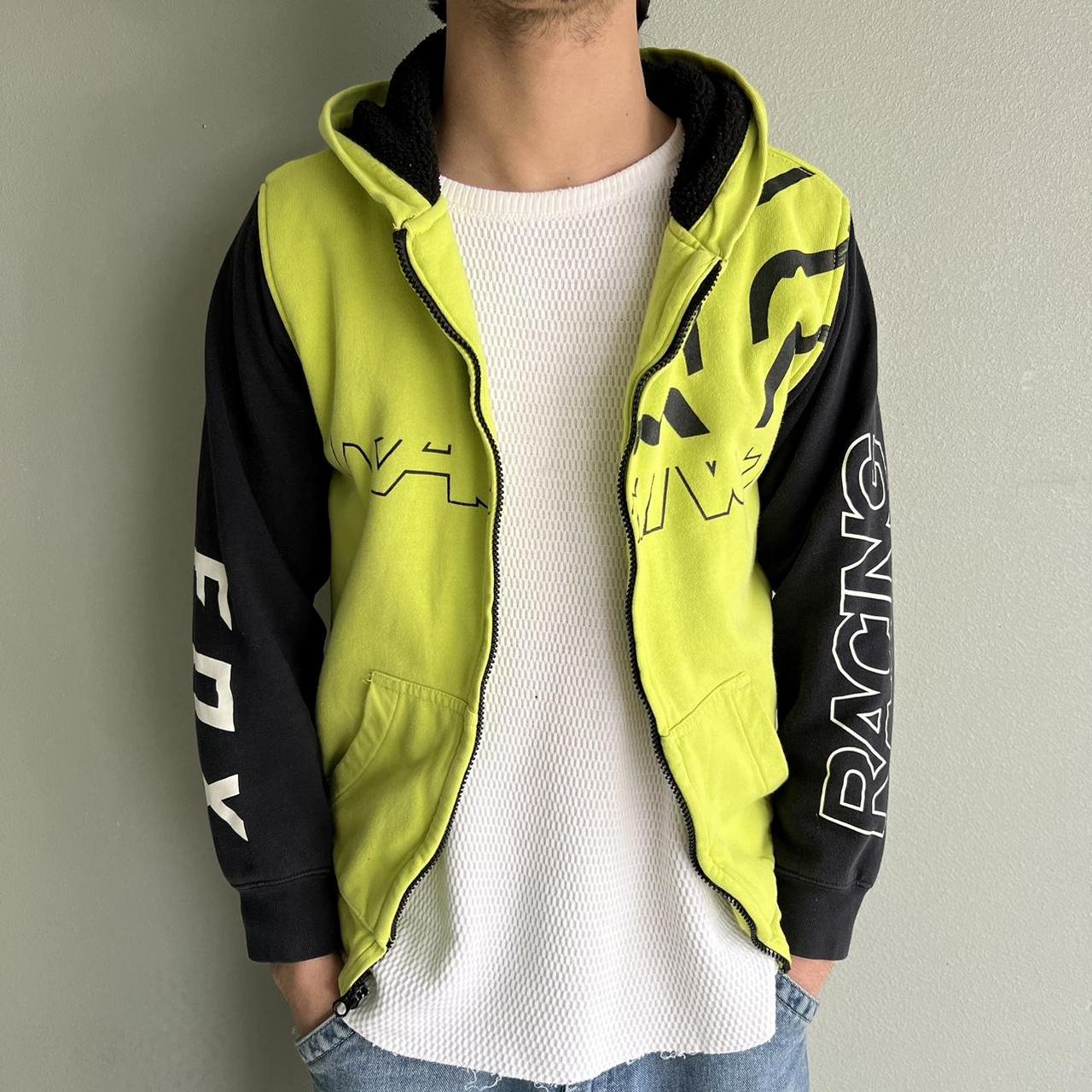 Lime green outlet and black hoodie