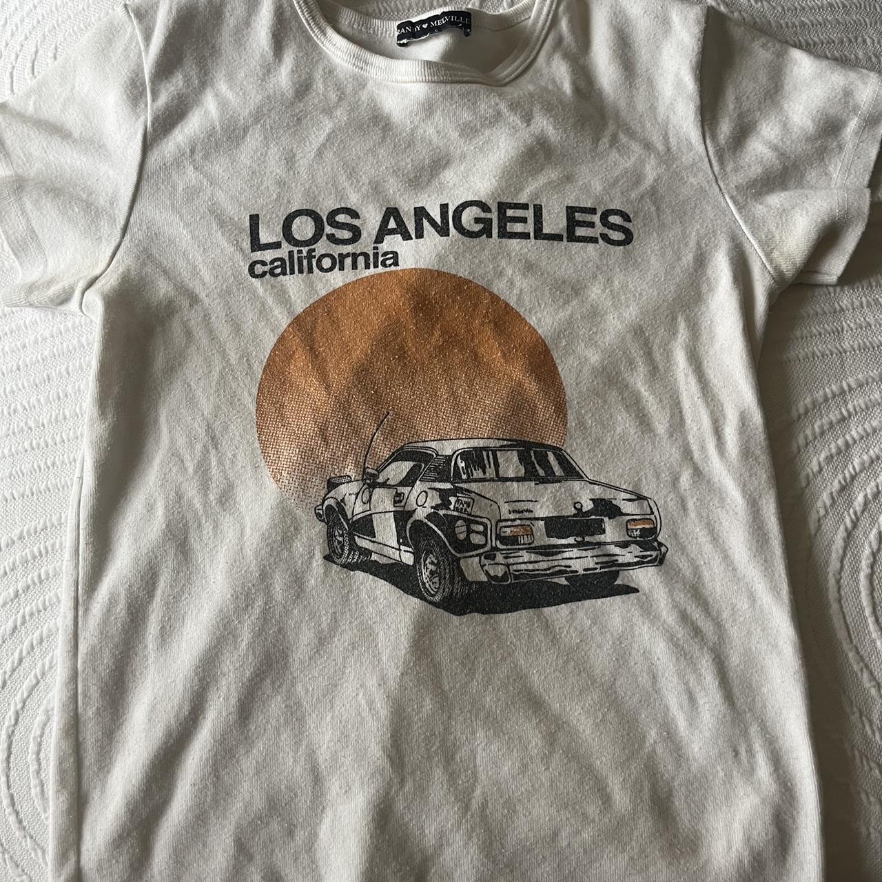 brandy melville graphic tee slight stains on arm... Depop