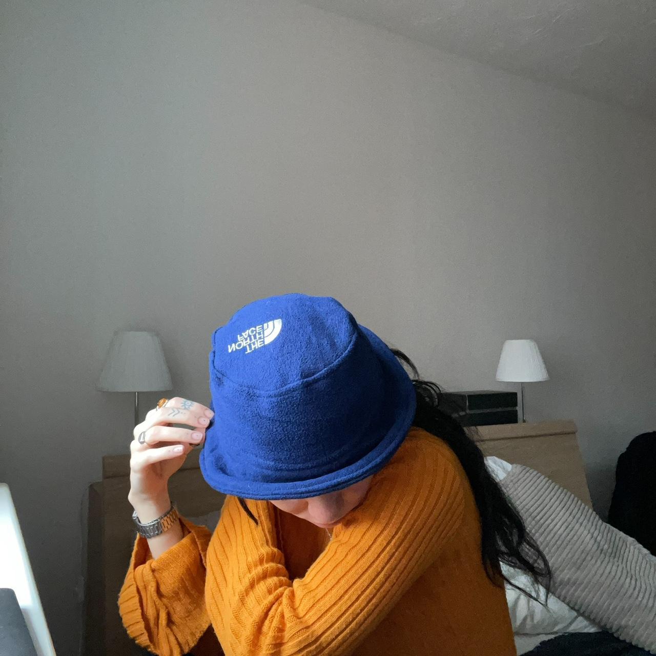 Blue bucket hat from The North Face made from. Depop