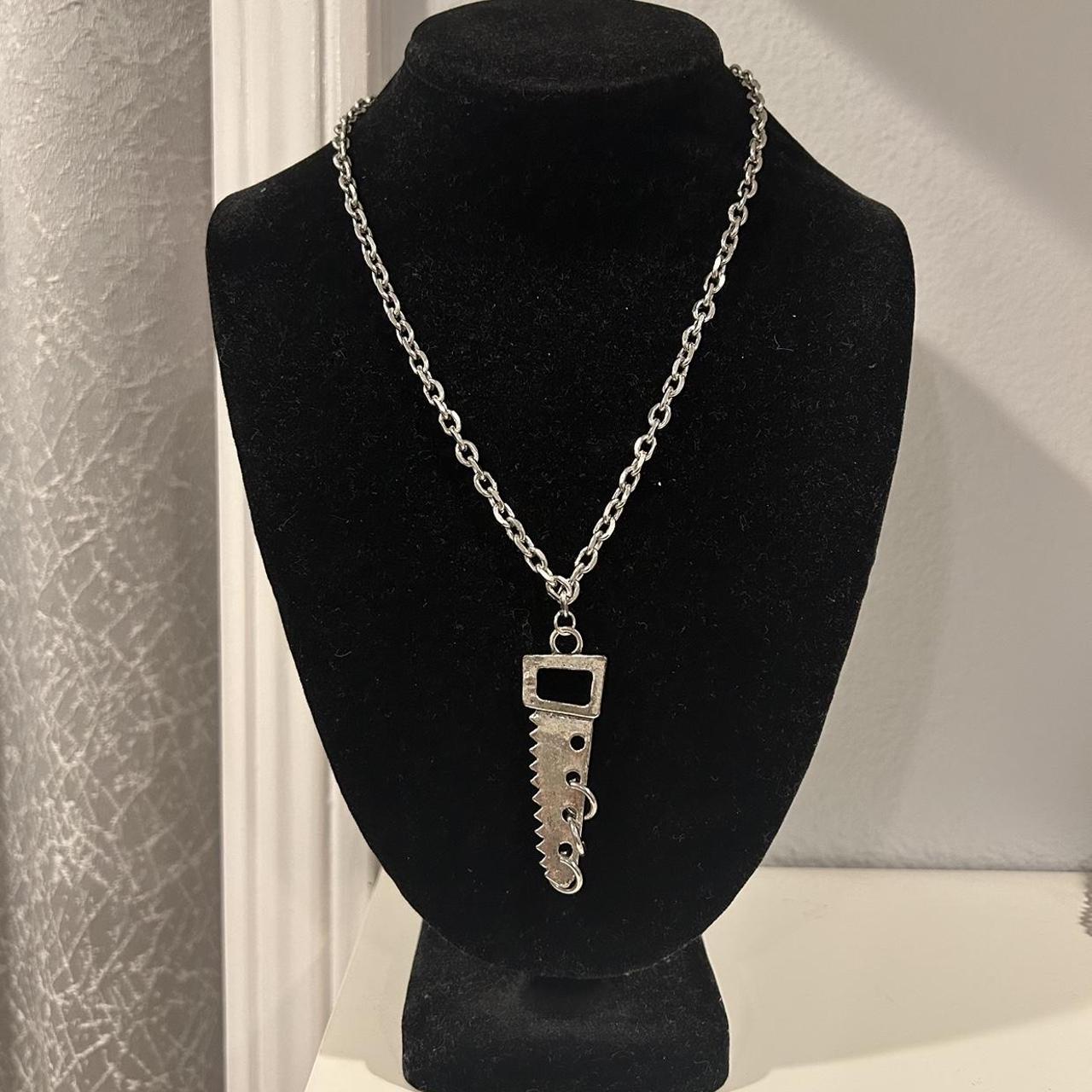 silver-colored saw necklace 🪚⛓️, NEVER WORN BEFORE