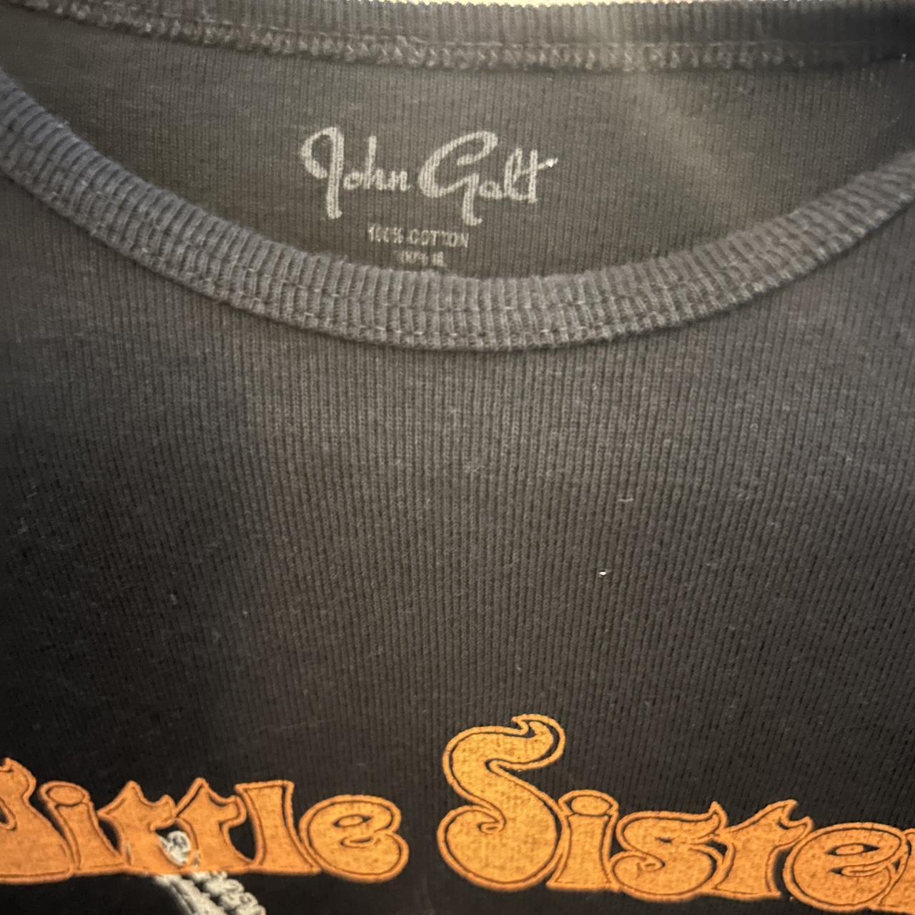 little sister john galt/ brandy melville baby tee.... Depop