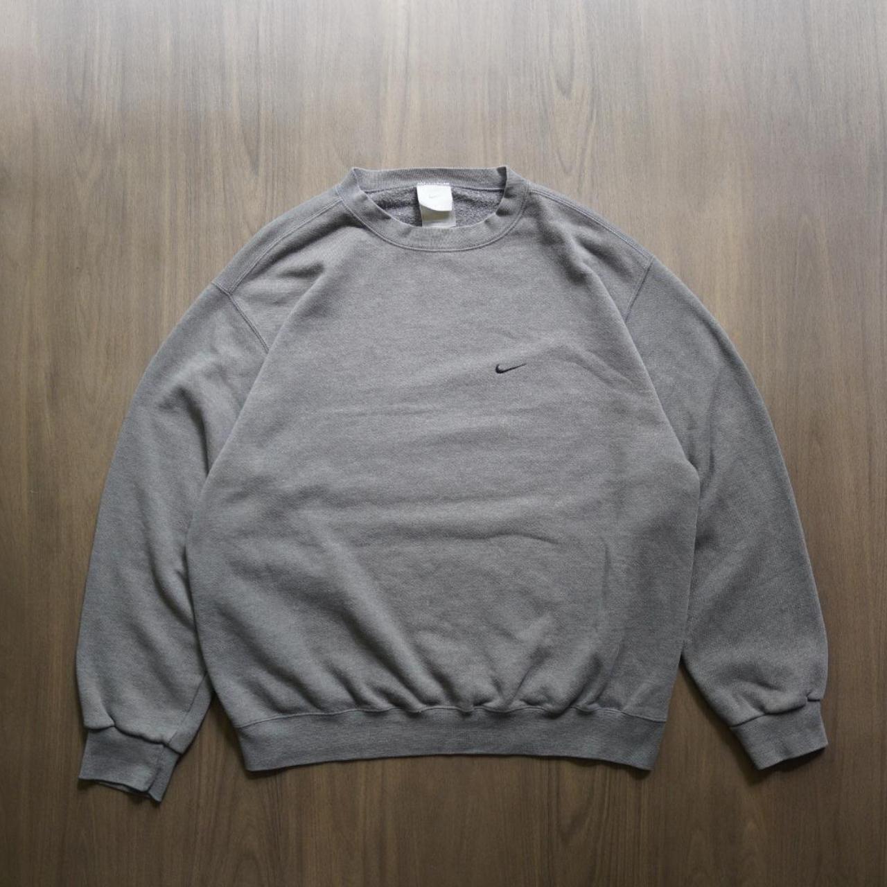 faded blue nike sweatshirt