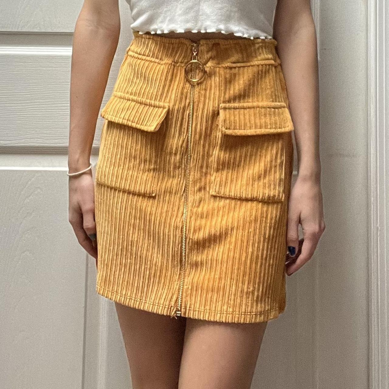 High waisted yellow skirt with gold zipper and. Depop