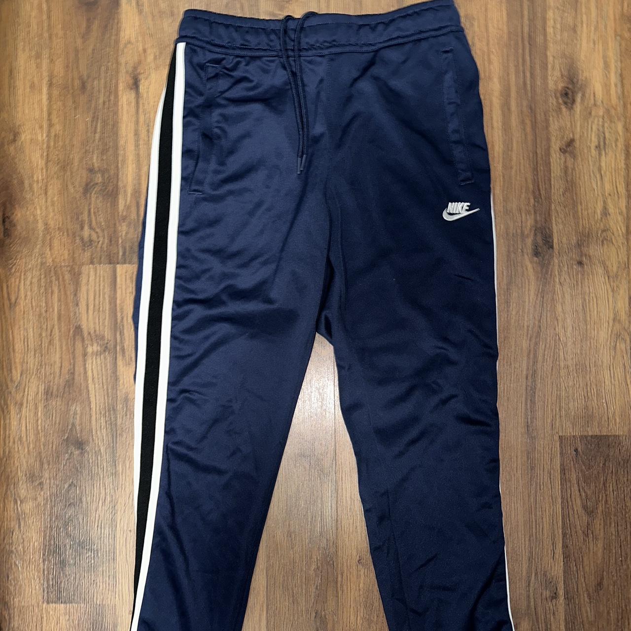 Blue Nike Pants Size small No flaws Message with any... - Depop