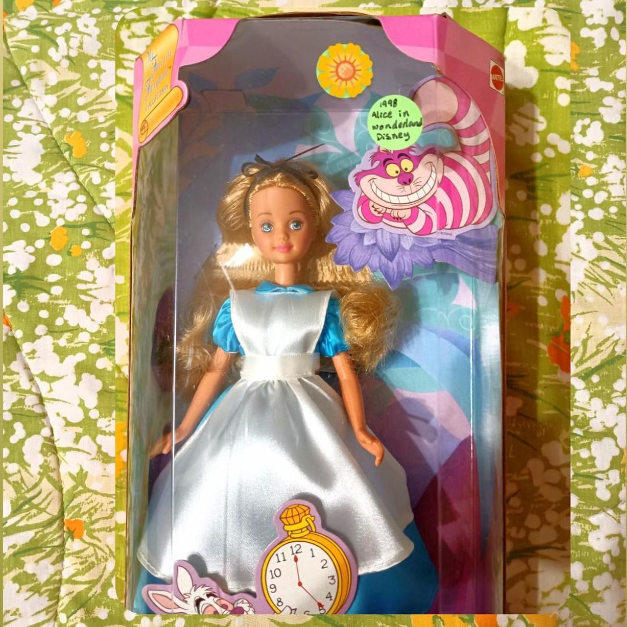 Collectible Alice in Wonderland with Mad Hatter, - Depop