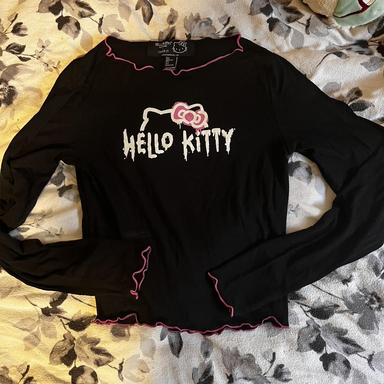 Hello Kitty black waterproof vinyl wraparound - Depop