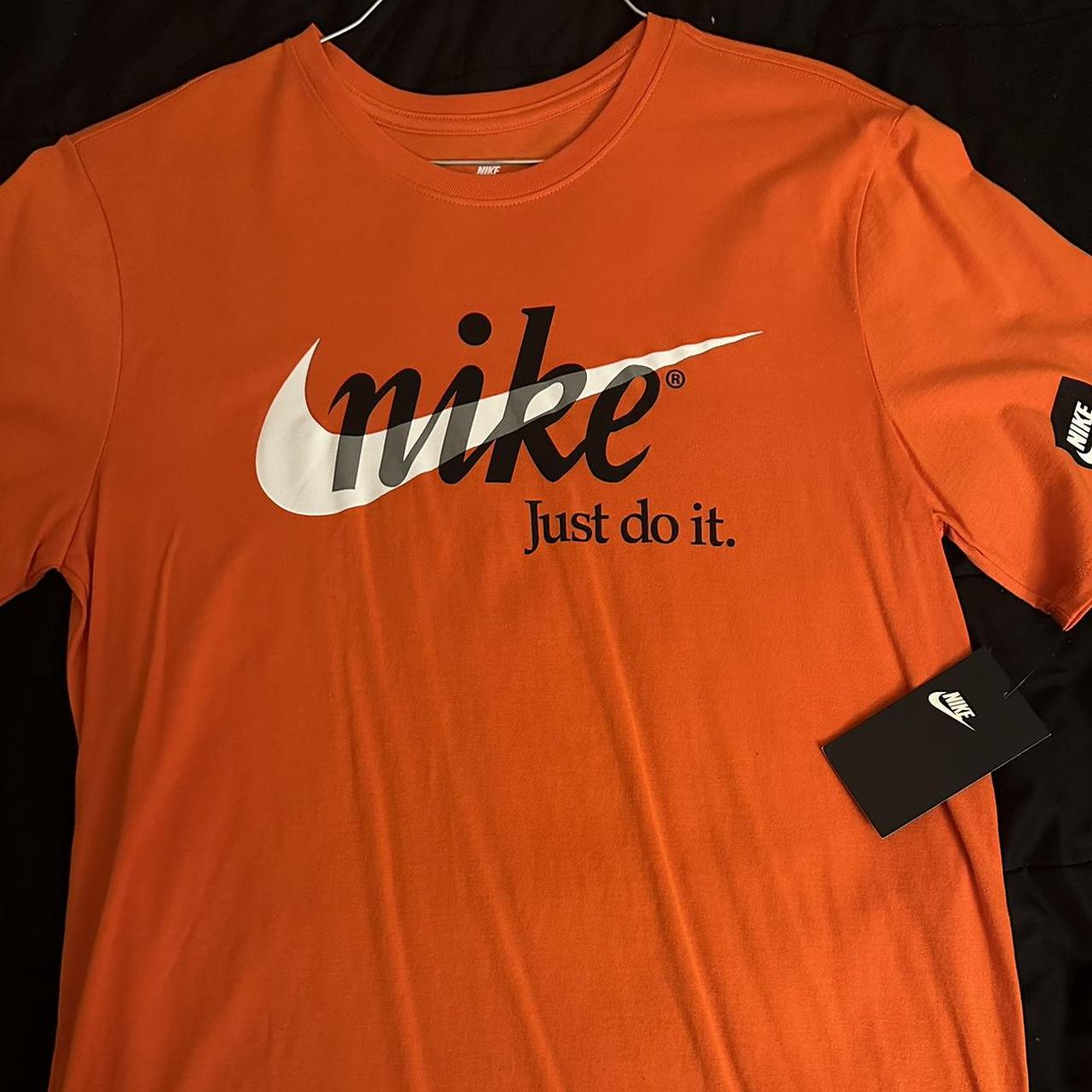royal blue and orange nike shirt